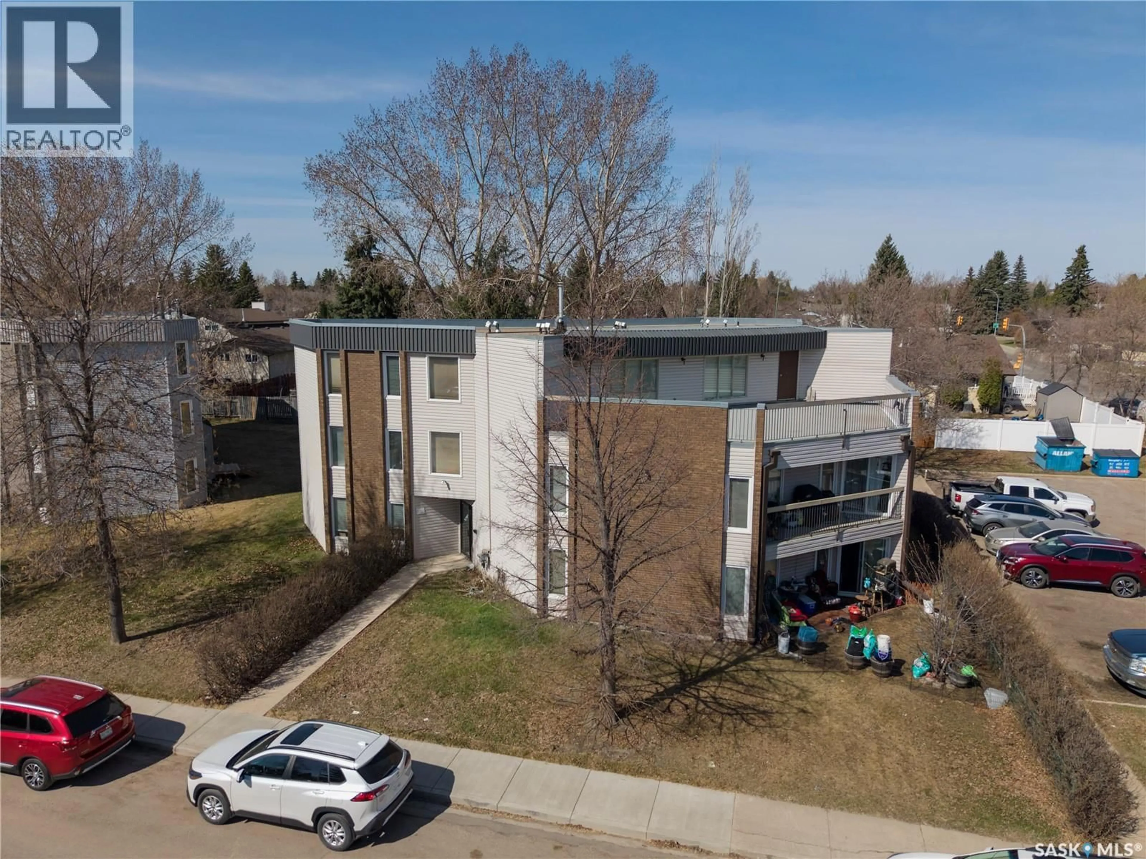 A pic from outside/outdoor area/front of a property/back of a property/a pic from drone, building for 302 - 303 TAIT CRESCENT, Saskatoon Saskatchewan S7H5L2