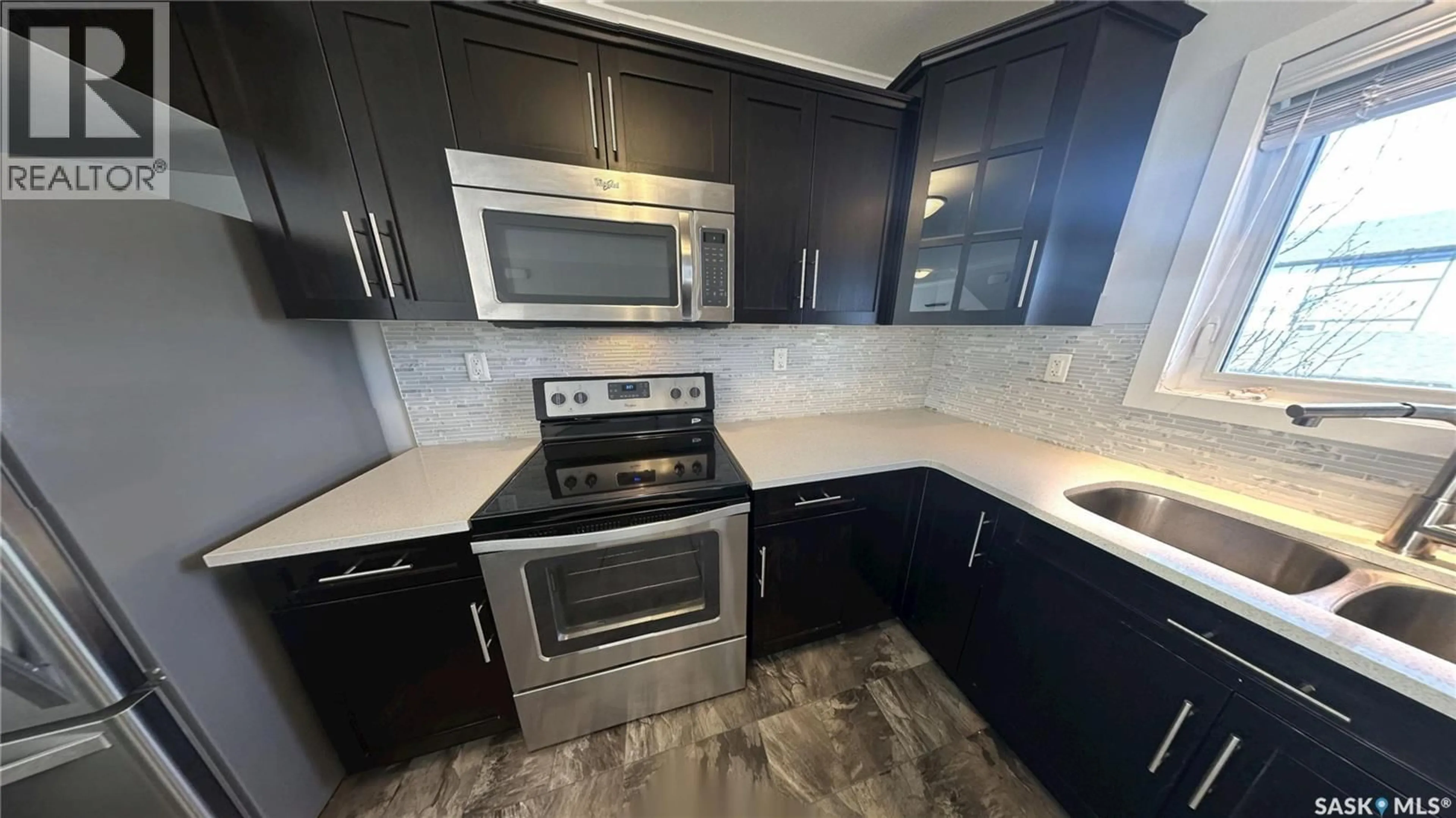 Standard kitchen, ceramic/tile floor for 250 - 271 AKHTAR BEND, Saskatoon Saskatchewan S7W0W4