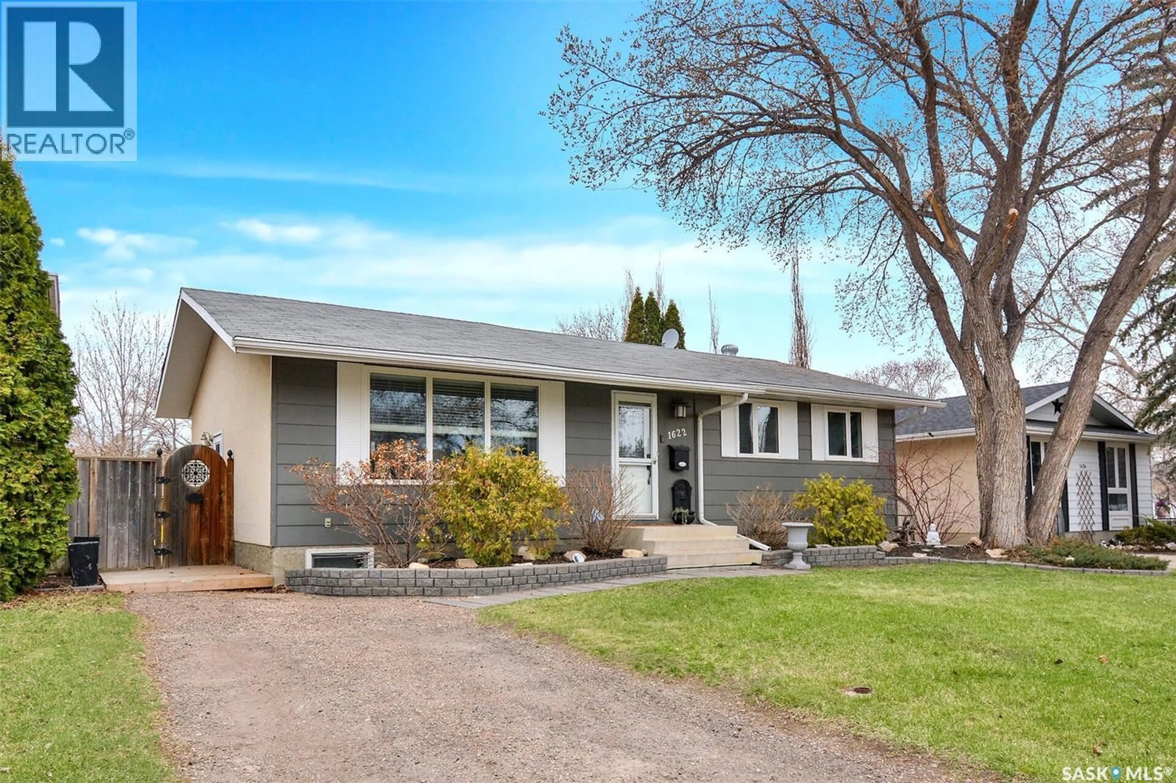 Home with vinyl exterior material, street for 1622 BRADWELL AVENUE, Saskatoon Saskatchewan S7N2P1