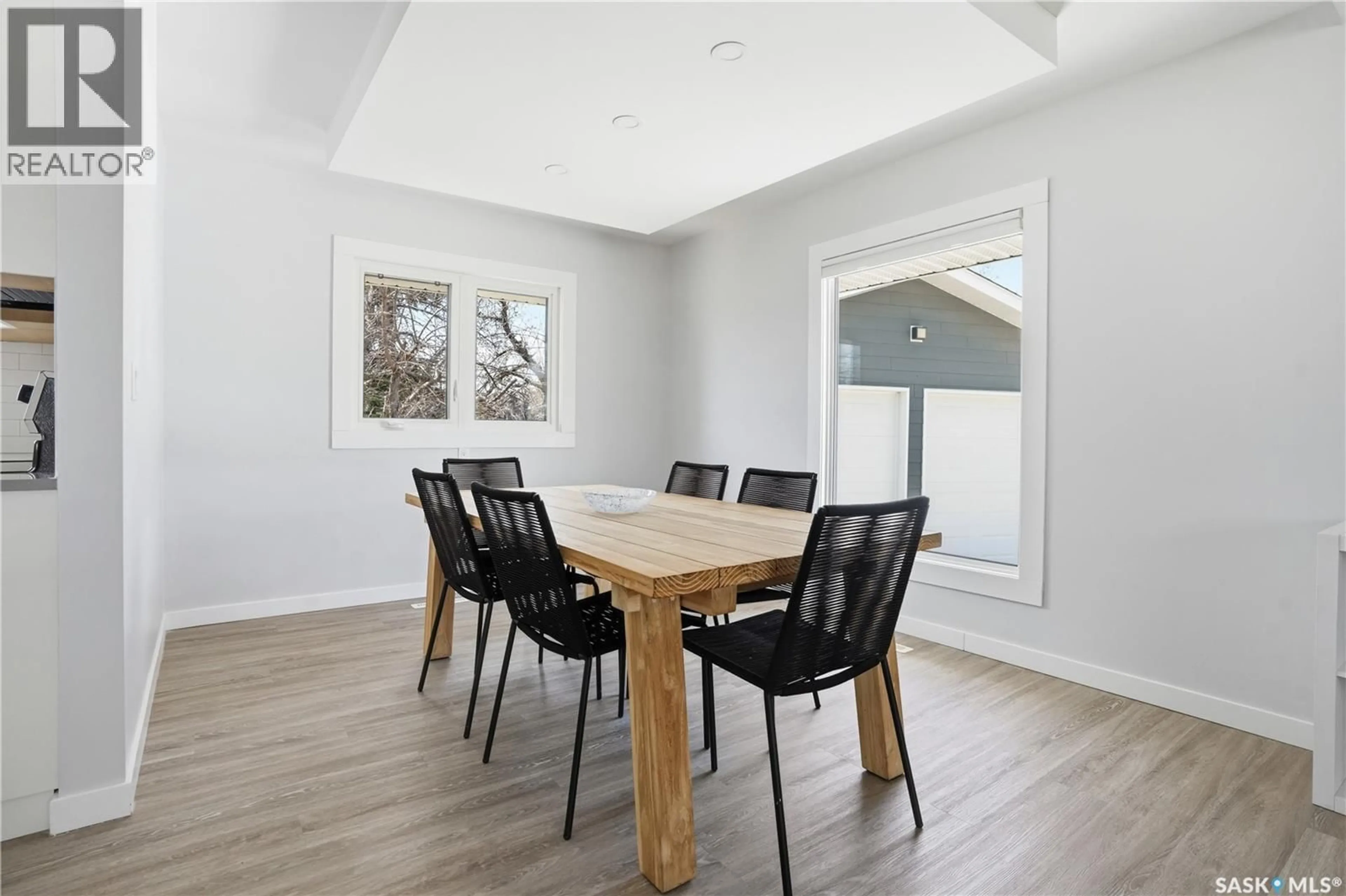 Dining room, wood/laminate floor for 73 DARKE CRESCENT, Regina Saskatchewan S4S3Y1