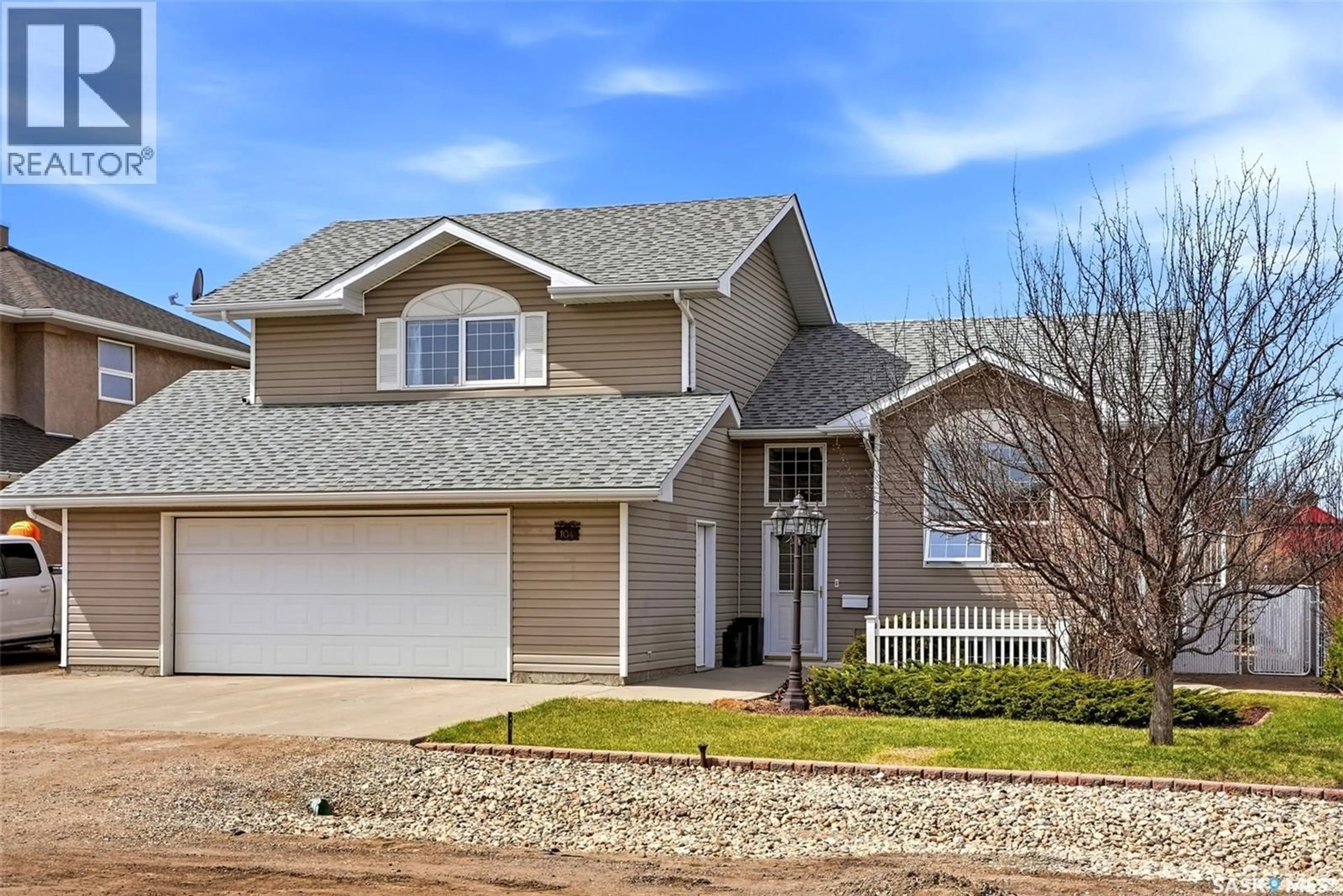 Home with vinyl exterior material, street for 104 PARK STREET, Grand Coulee Saskatchewan S4M0A3