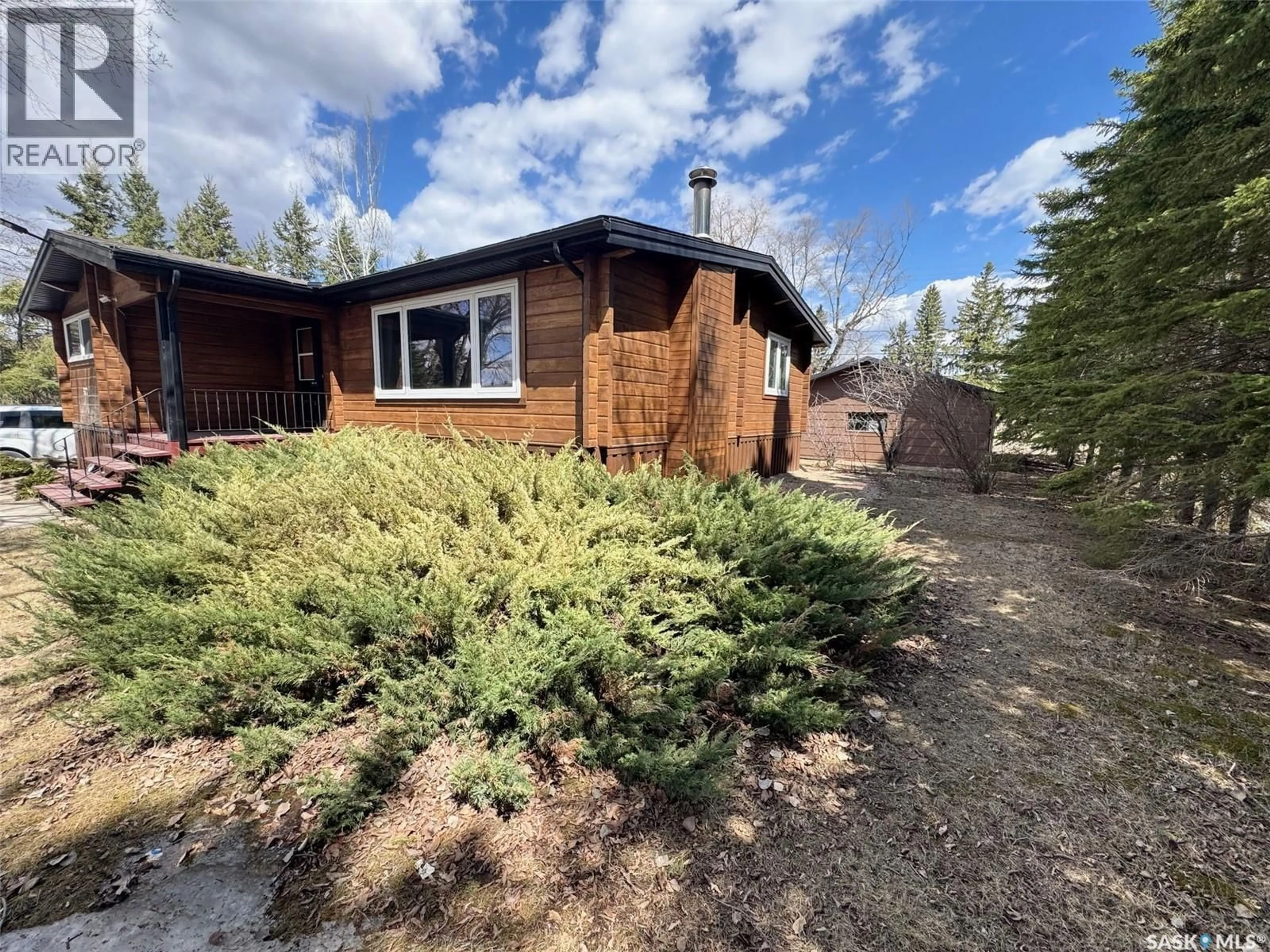 A pic from outside/outdoor area/front of a property/back of a property/a pic from drone, unknown for 500-504 1ST AVENUE, Rose Valley Saskatchewan S0E1M0