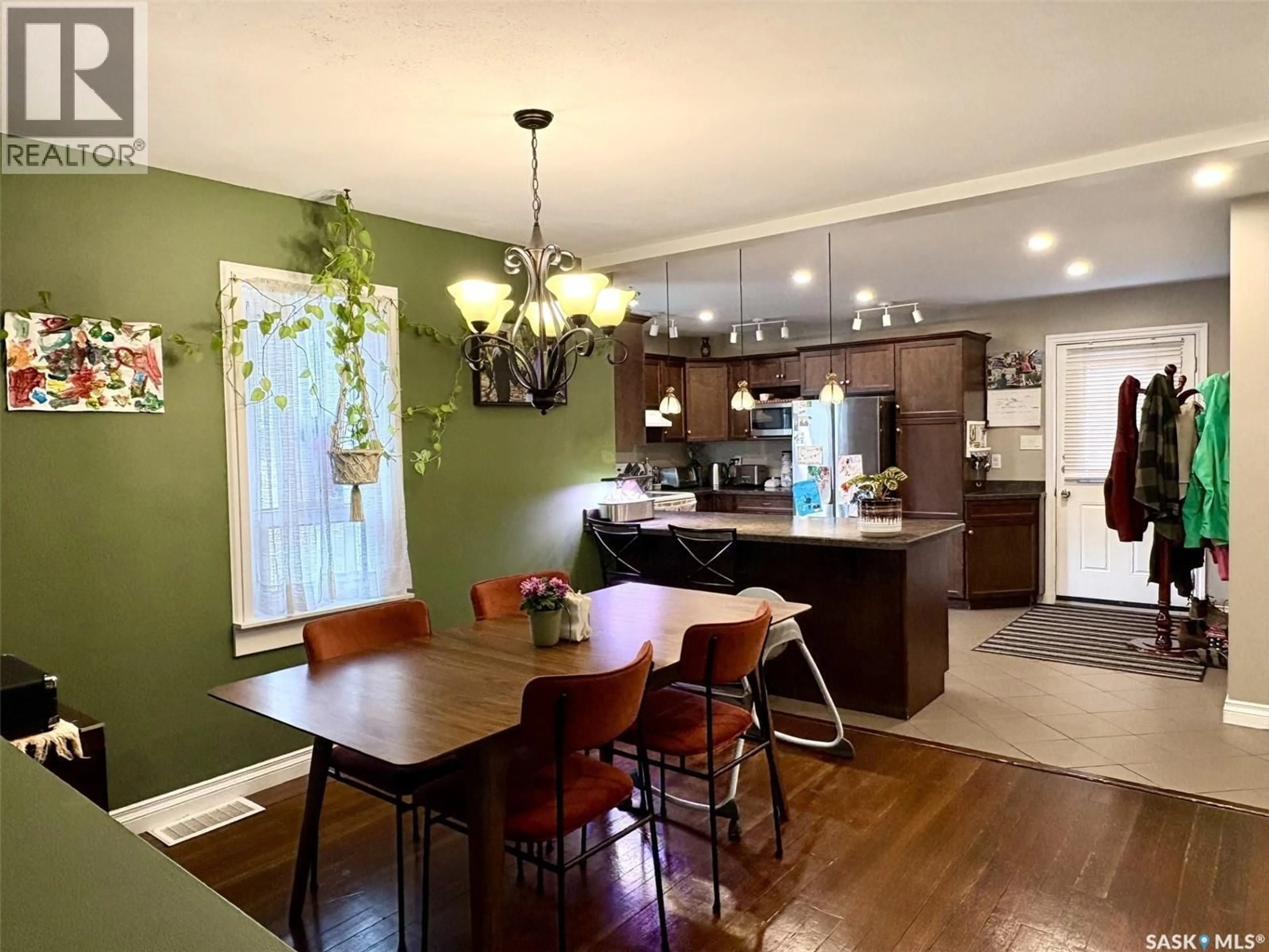 Open concept kitchen, wood/laminate floor for 270 2ND AVENUE, Yorkton Saskatchewan S3N1G9