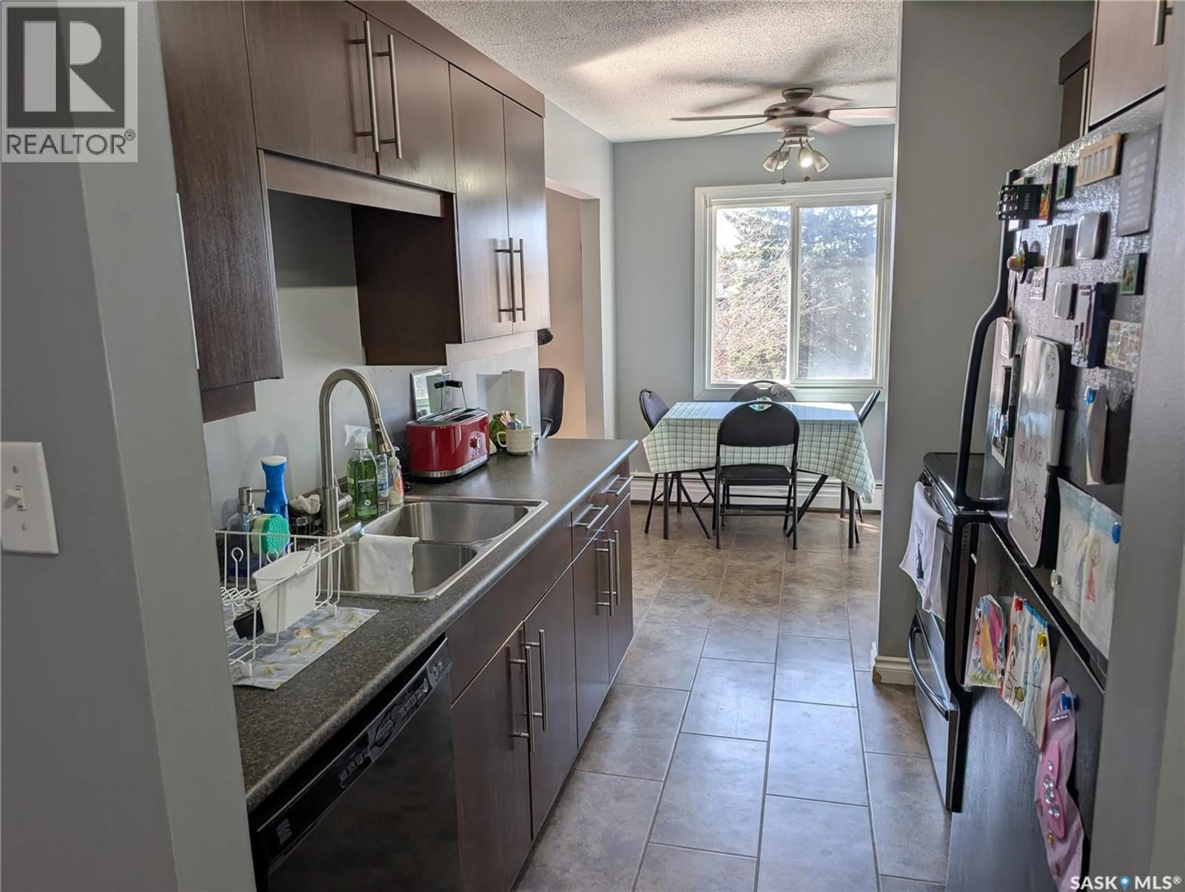 Standard kitchen, ceramic/tile floor for 13 3030 ARLINGTON AVENUE, Saskatoon Saskatchewan S7J2J9