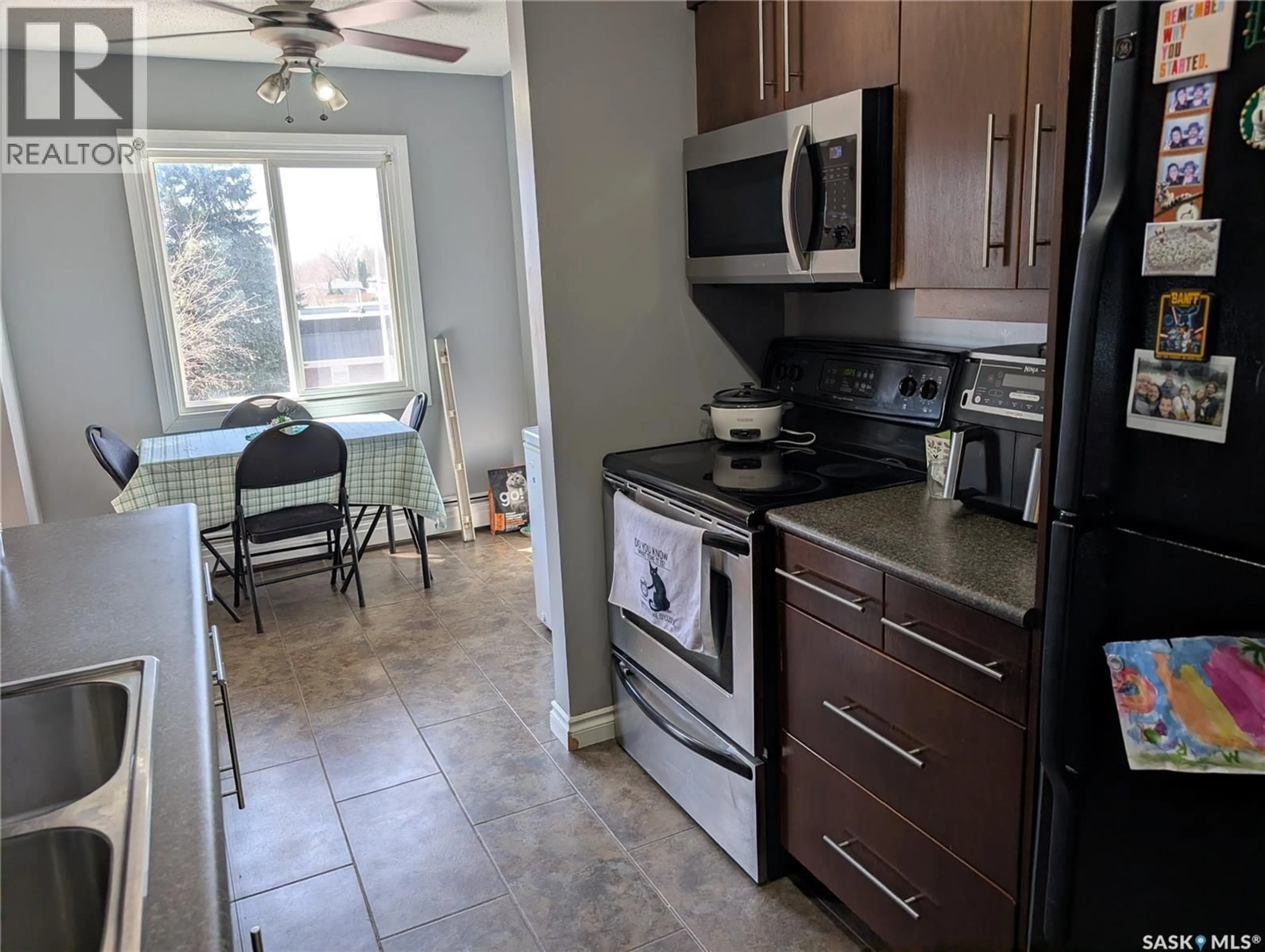 Standard kitchen, ceramic/tile floor for 13 3030 ARLINGTON AVENUE, Saskatoon Saskatchewan S7J2J9