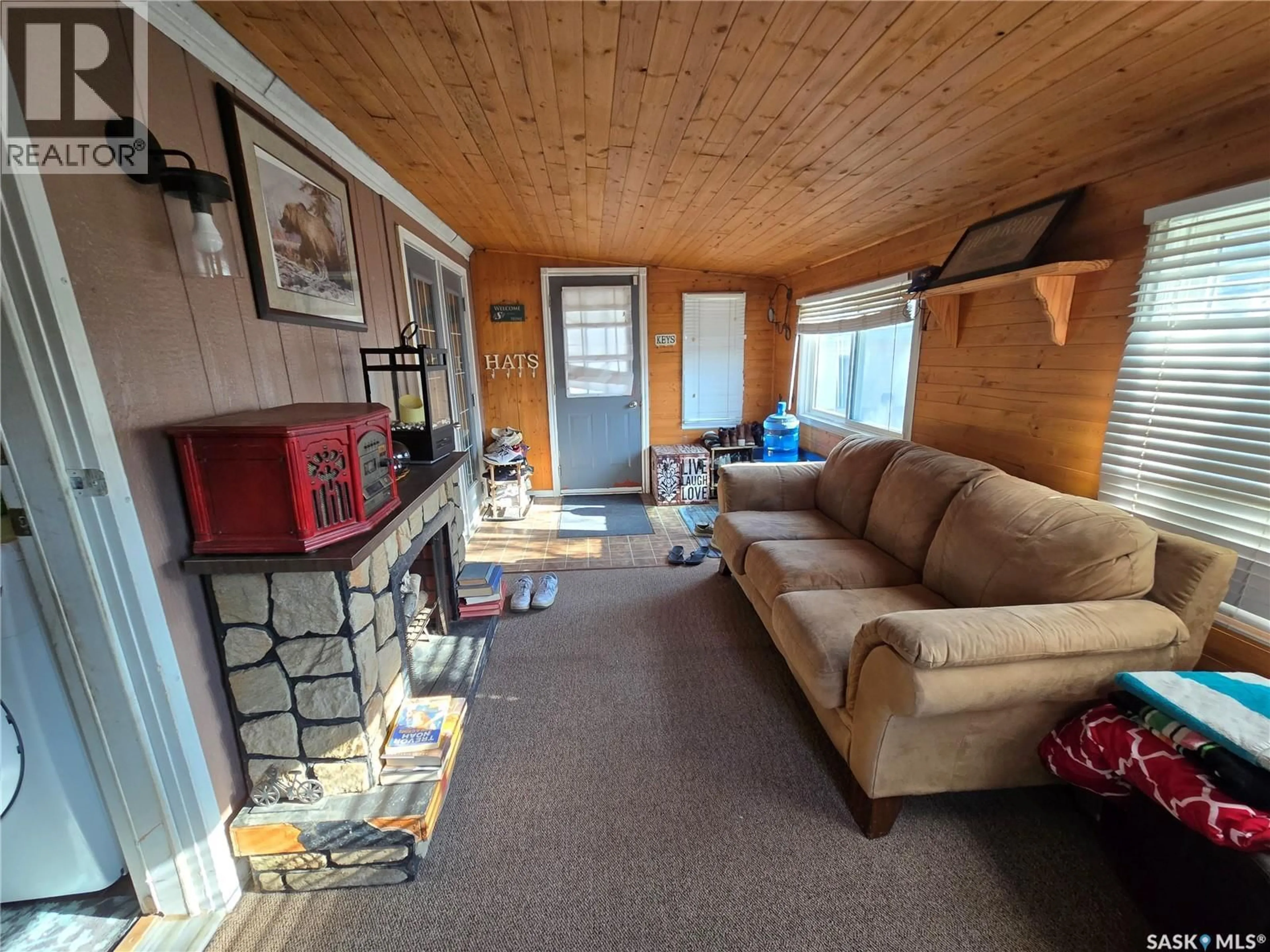Living room with furniture, unknown for 38 PRAIRIE SUN COURT, Swift Current Saskatchewan S9H3X3