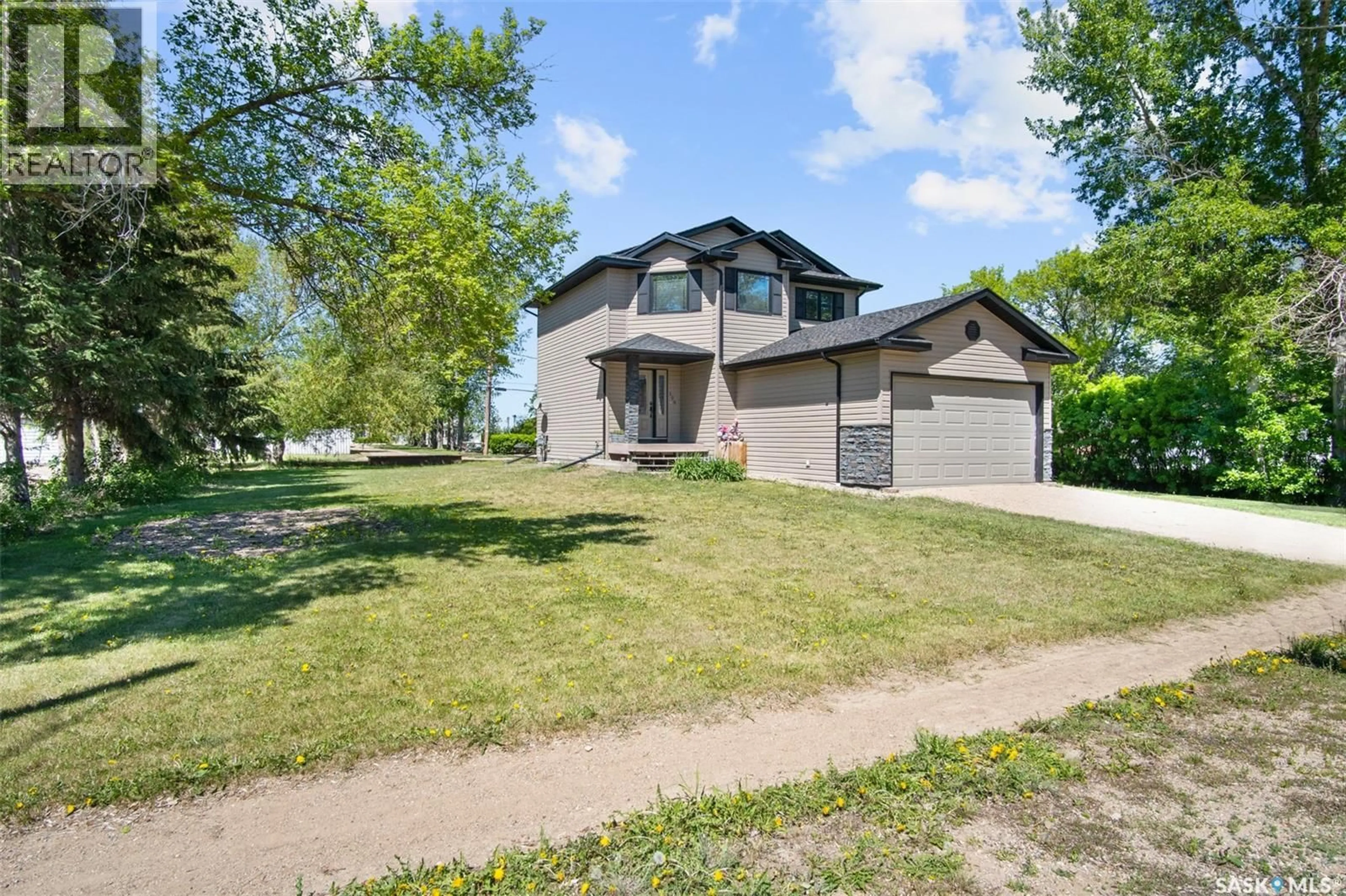 A pic from outside/outdoor area/front of a property/back of a property/a pic from drone, unknown for 106 2ND AVENUE, Lucky Lake Saskatchewan S0L1Z0