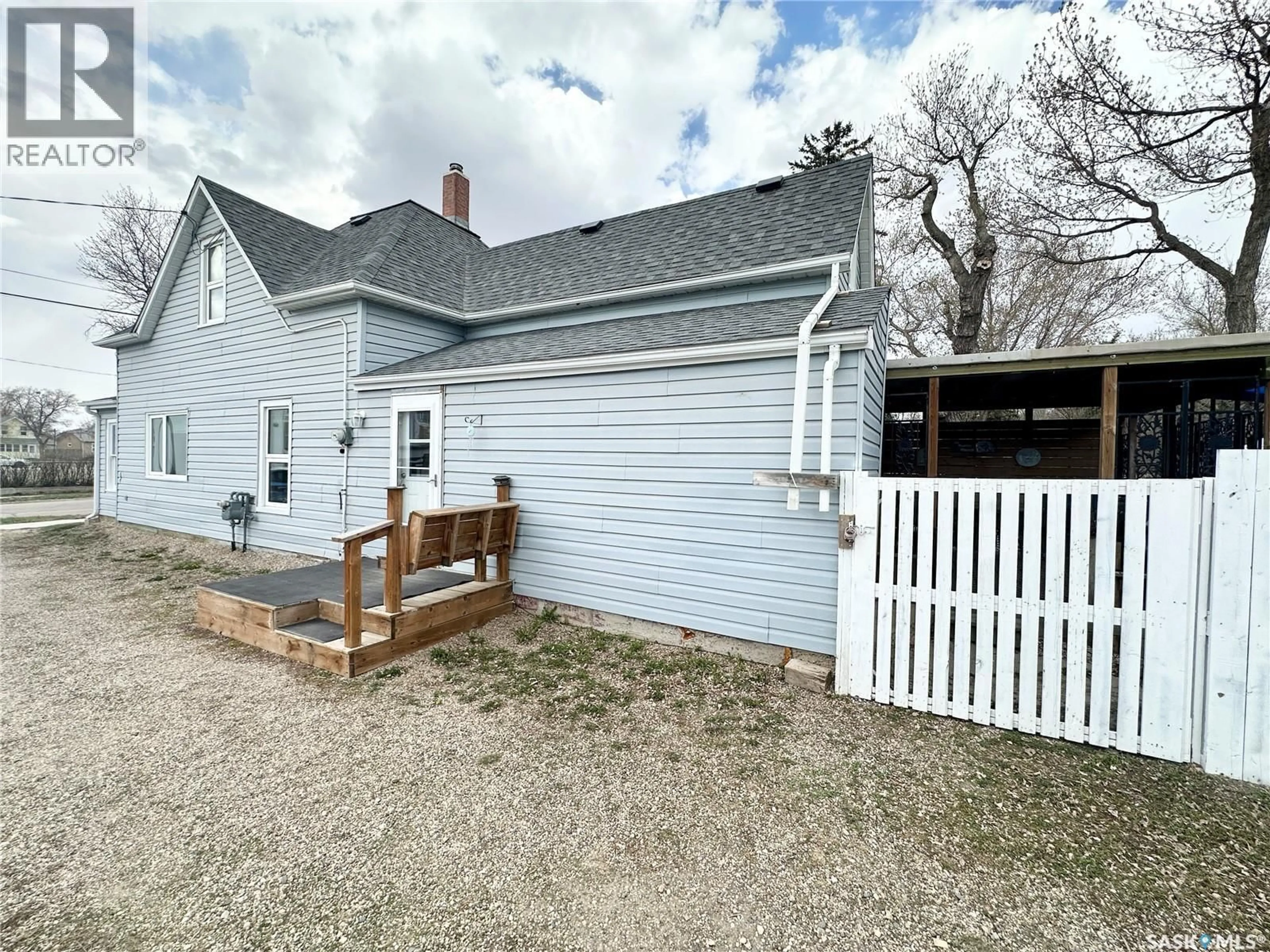 A pic from outside/outdoor area/front of a property/back of a property/a pic from drone, street for 212 FOSTER STREET, Weyburn Saskatchewan S4H0R1