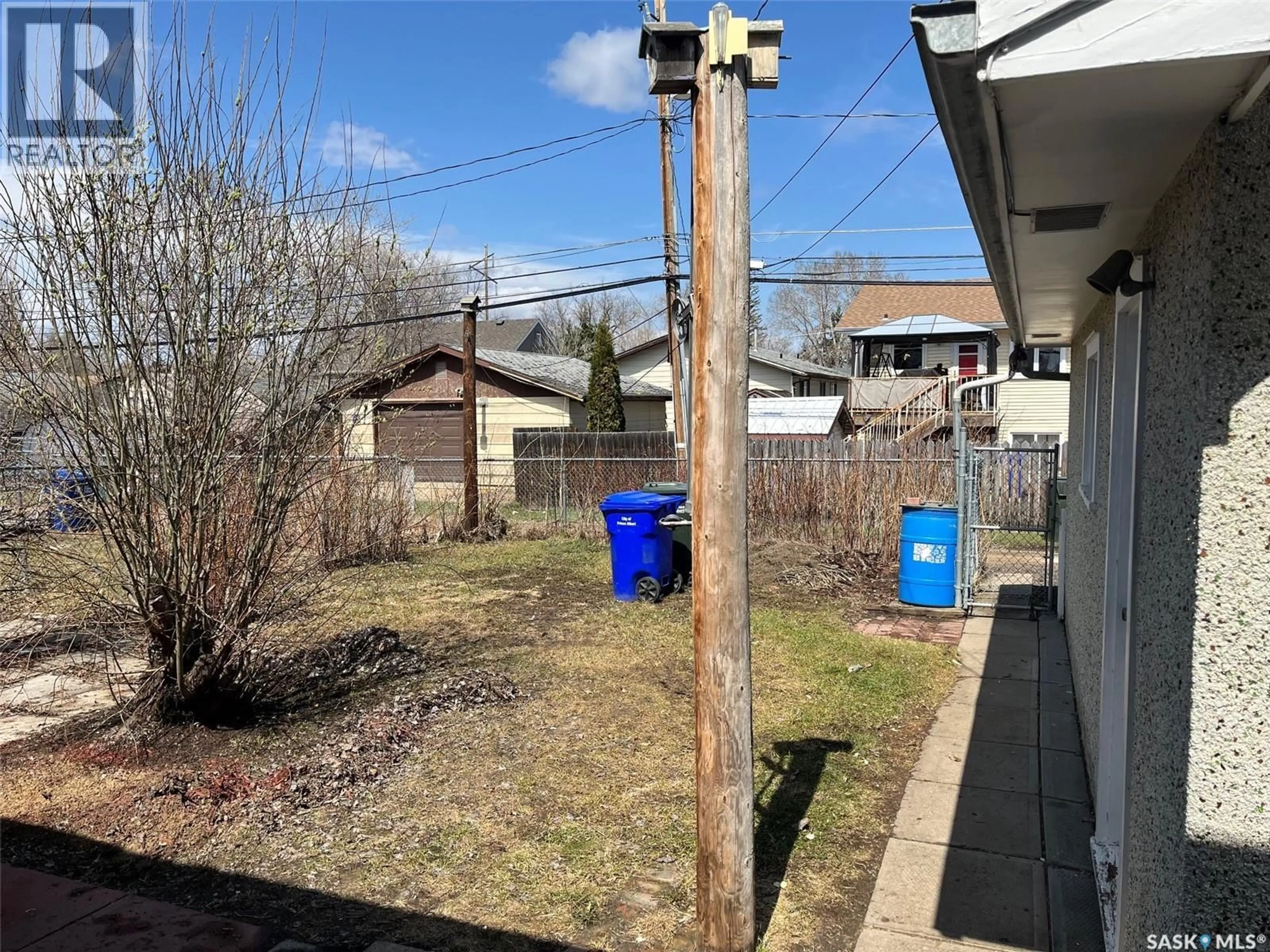 A pic from outside/outdoor area/front of a property/back of a property/a pic from drone, street for 1010 13TH STREET, Prince Albert Saskatchewan S6V3H7