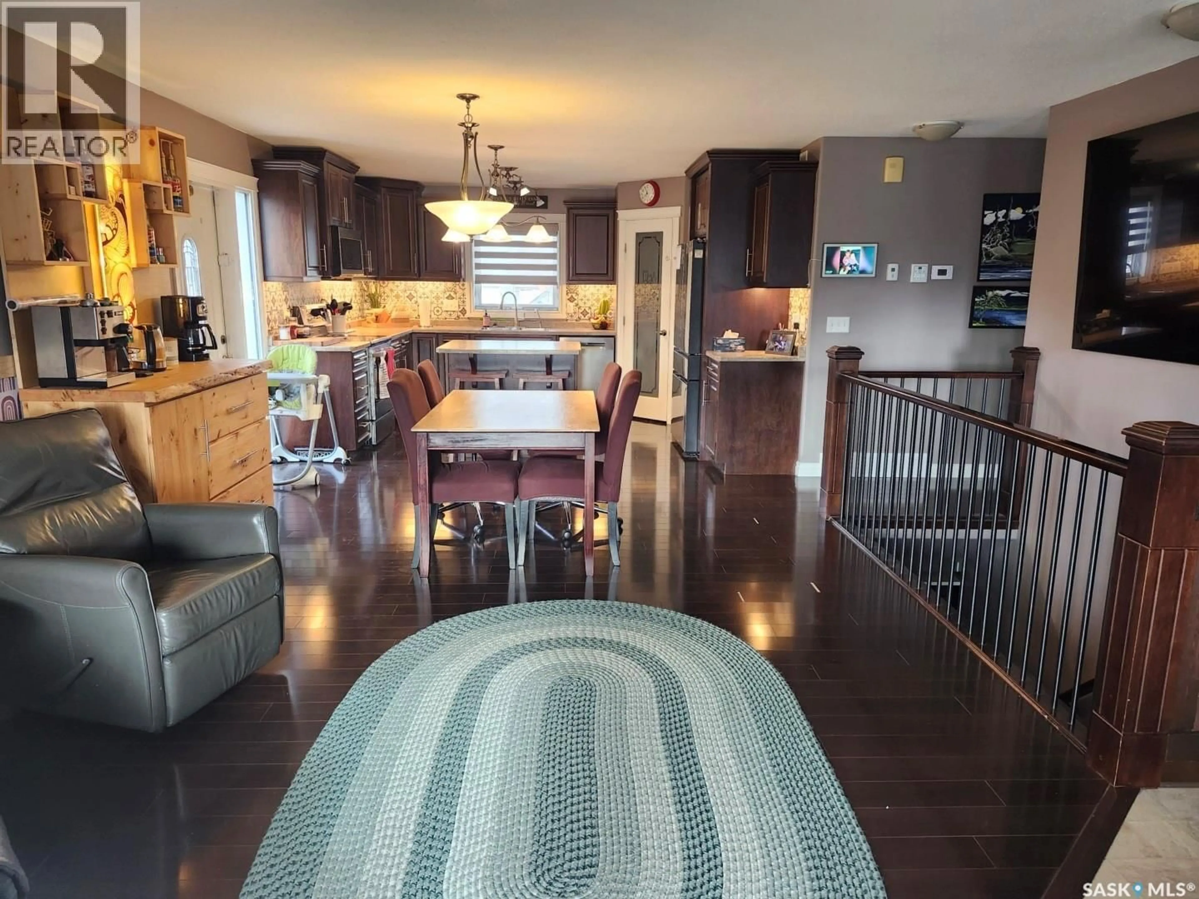 Open concept kitchen, wood/laminate floor for 505 CARDINAL COURT, Shellbrook Saskatchewan S0J2E0