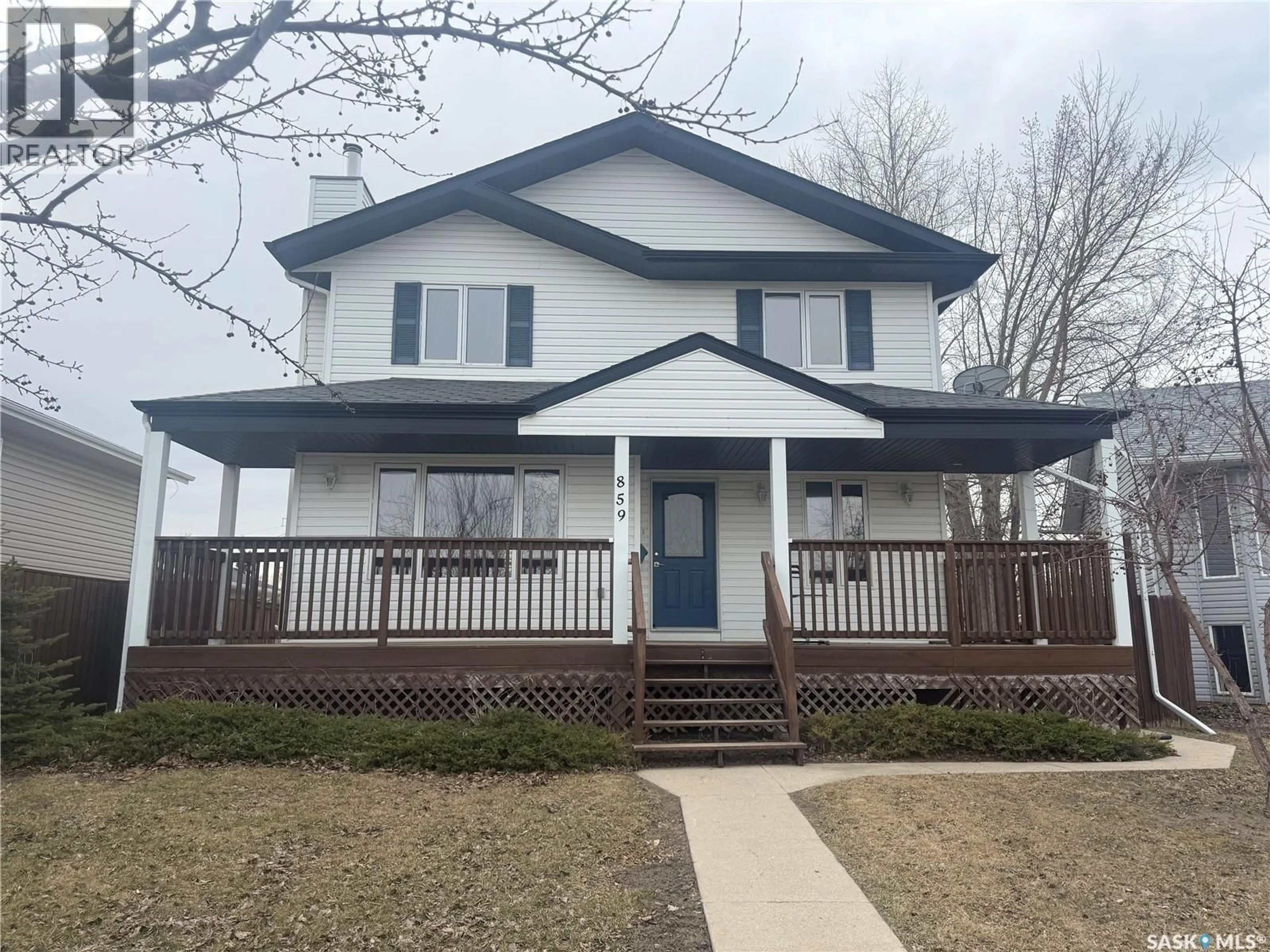Home with vinyl exterior material, street for 859 RUTHERFORD WAY, Saskatoon Saskatchewan S7N4X6