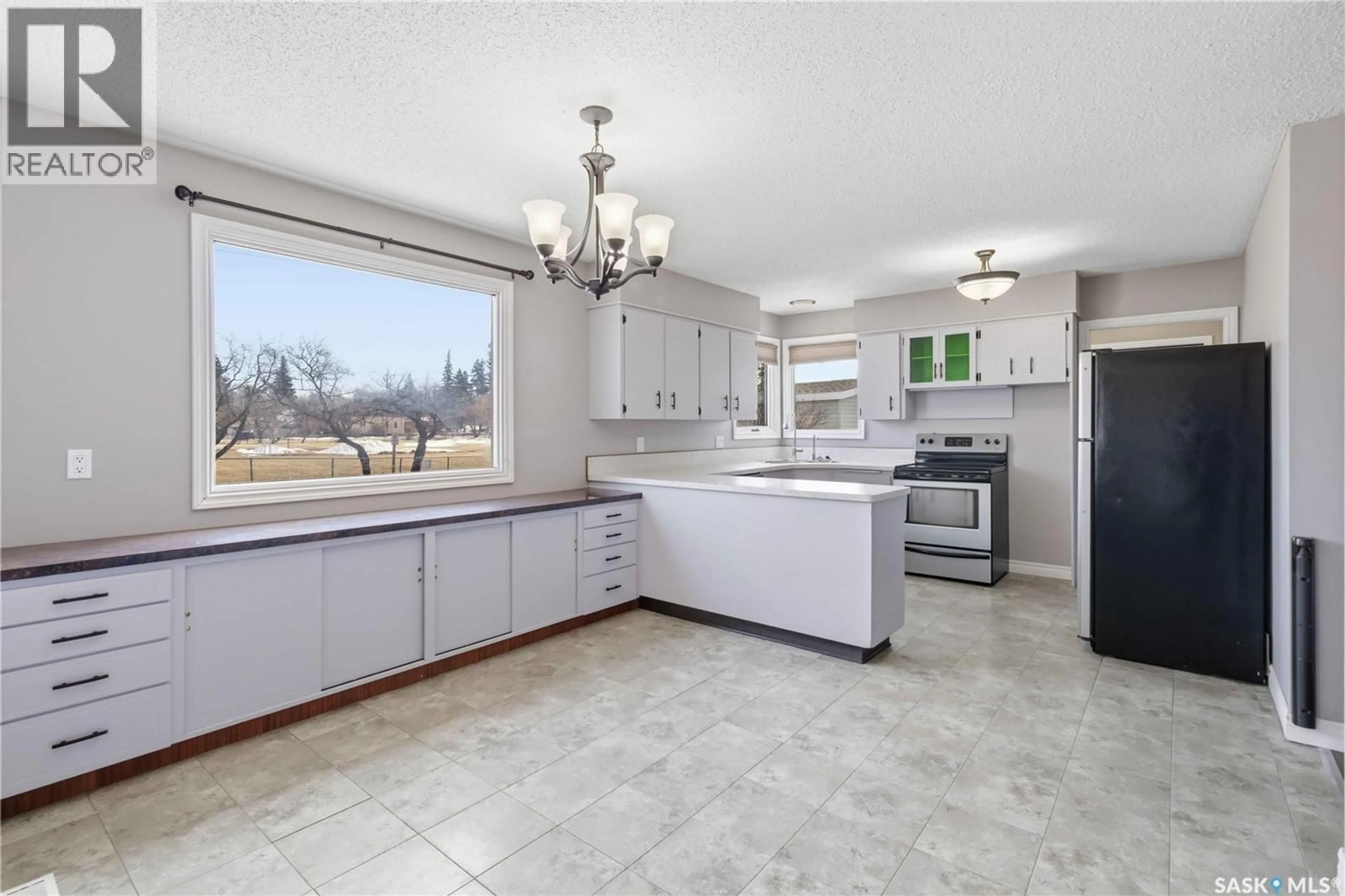 Open concept kitchen, ceramic/tile floor for 8 PARK AVENUE, Langham Saskatchewan S0K2L0