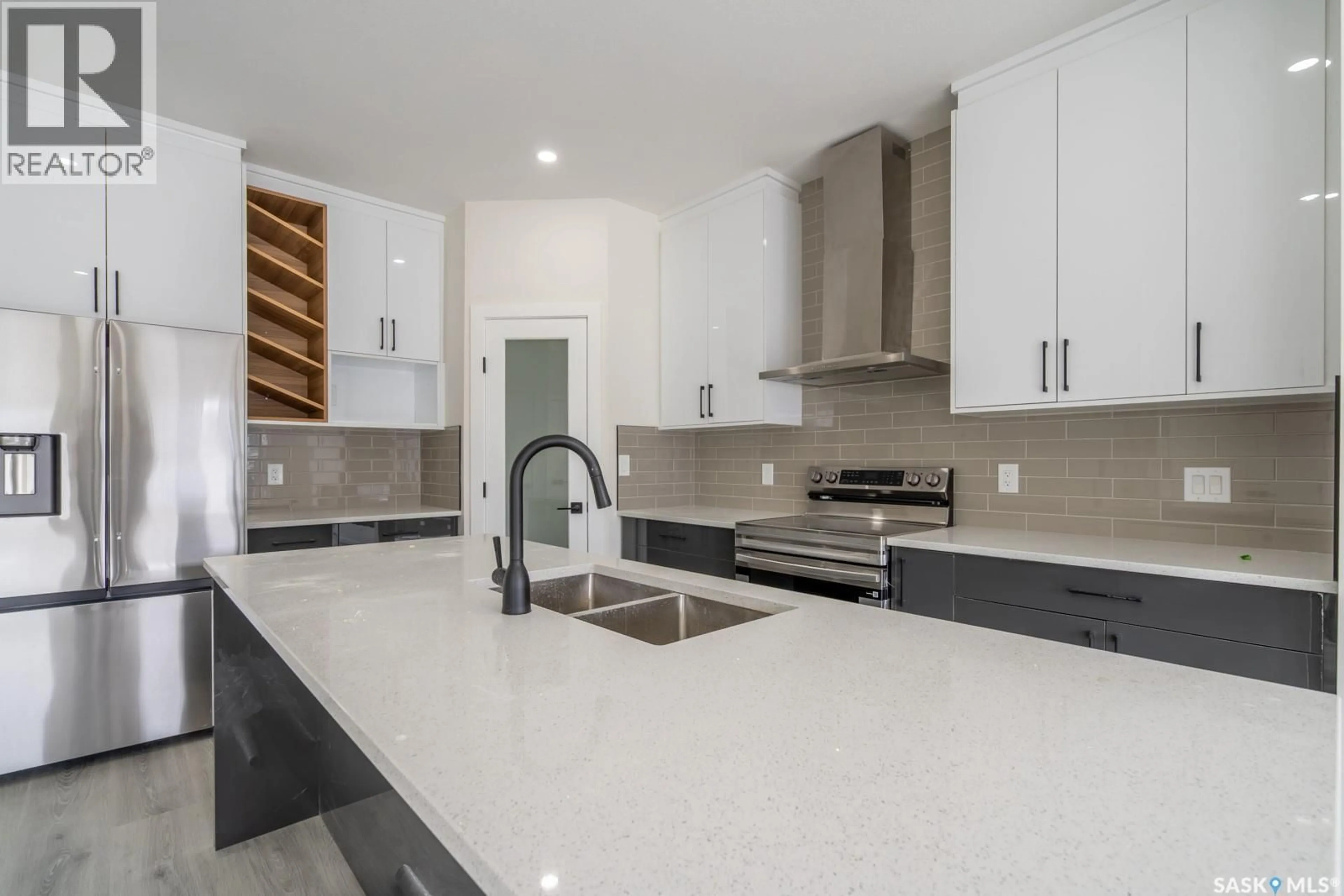 Open concept kitchen, ceramic/tile floor for 1142 POLEY STREET, Regina Saskatchewan S4R8H3