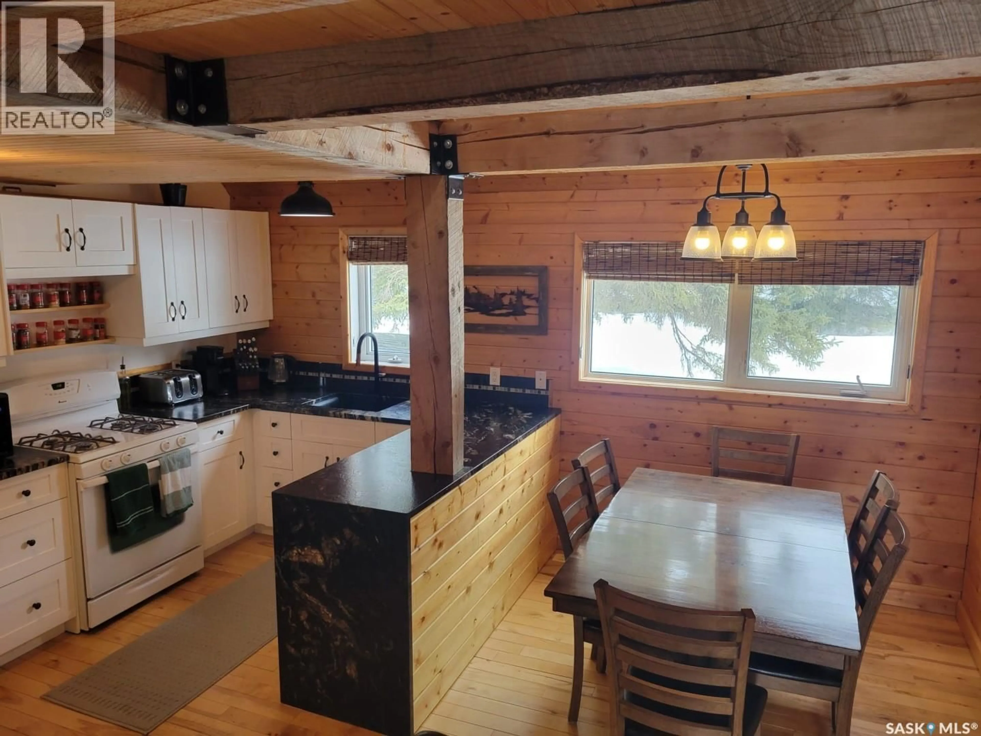 Open concept kitchen, wood/laminate floor for 901 BRIGHTSAND PLACE, Mervin Rm No.499 Saskatchewan S0M2T0