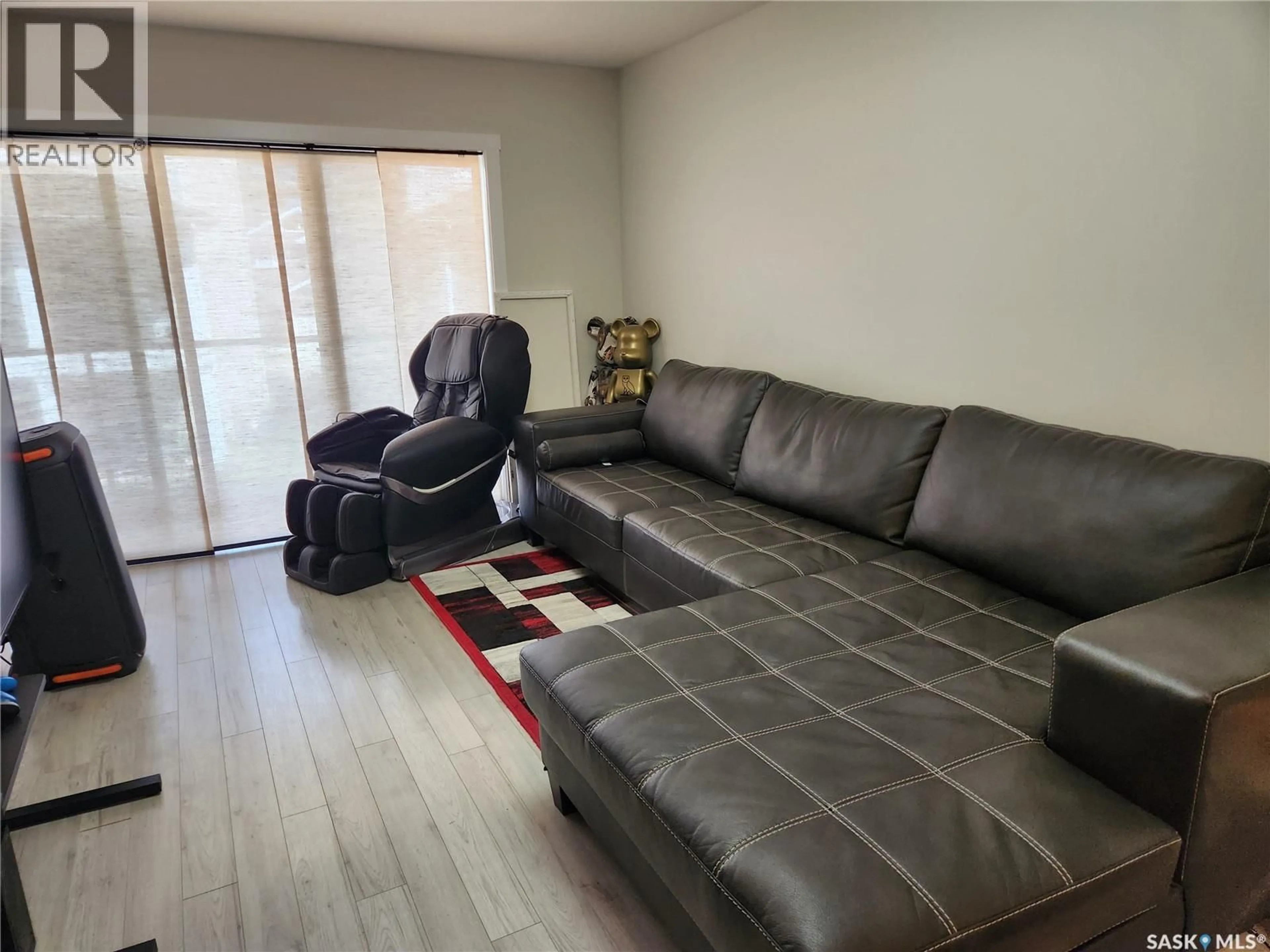 Living room with furniture, unknown for #212 - 315 DICKSON CRESCENT, Saskatoon Saskatchewan S7T0T8