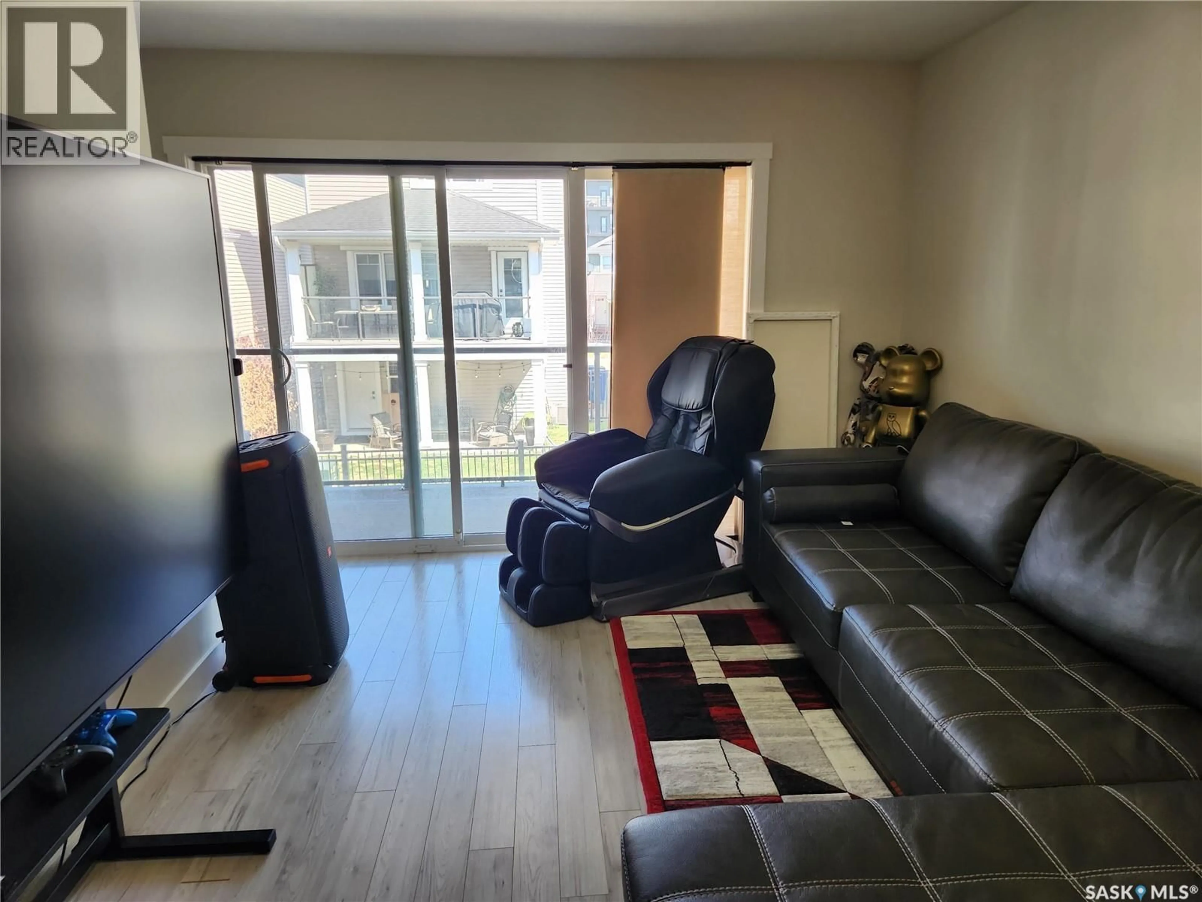 Living room with furniture, unknown for #212 - 315 DICKSON CRESCENT, Saskatoon Saskatchewan S7T0T8