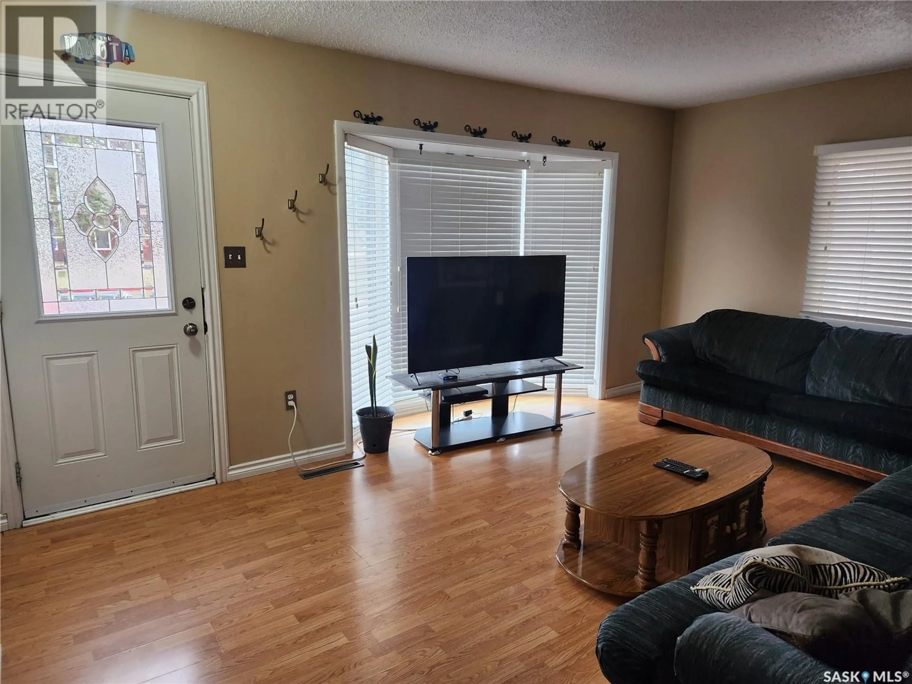 Living room with furniture, unknown for 1018 108TH AVENUE, Tisdale Saskatchewan S0E1T0