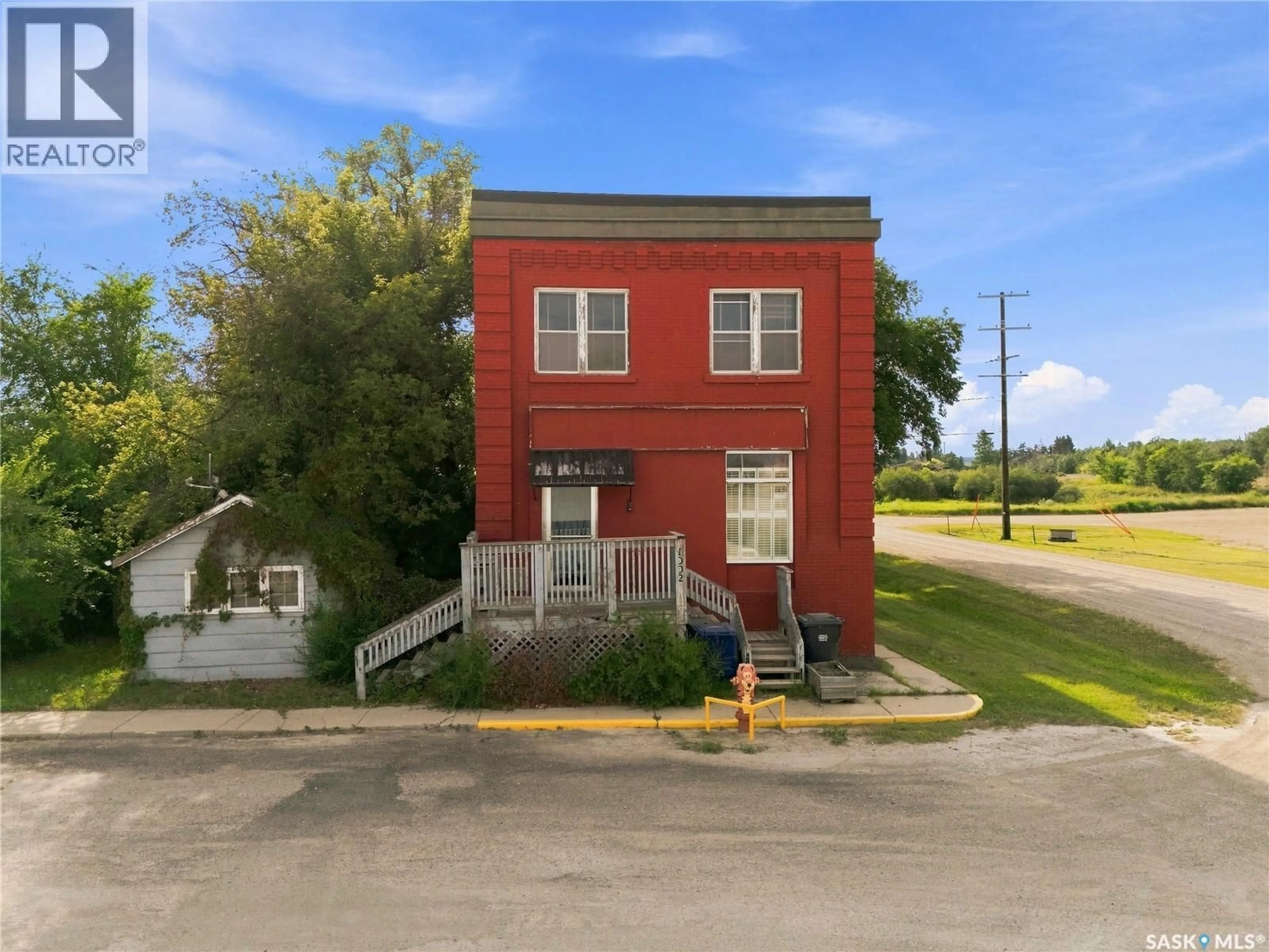 A pic from outside/outdoor area/front of a property/back of a property/a pic from drone, building for 1002 9TH STREET, Perdue Saskatchewan S0K3C0