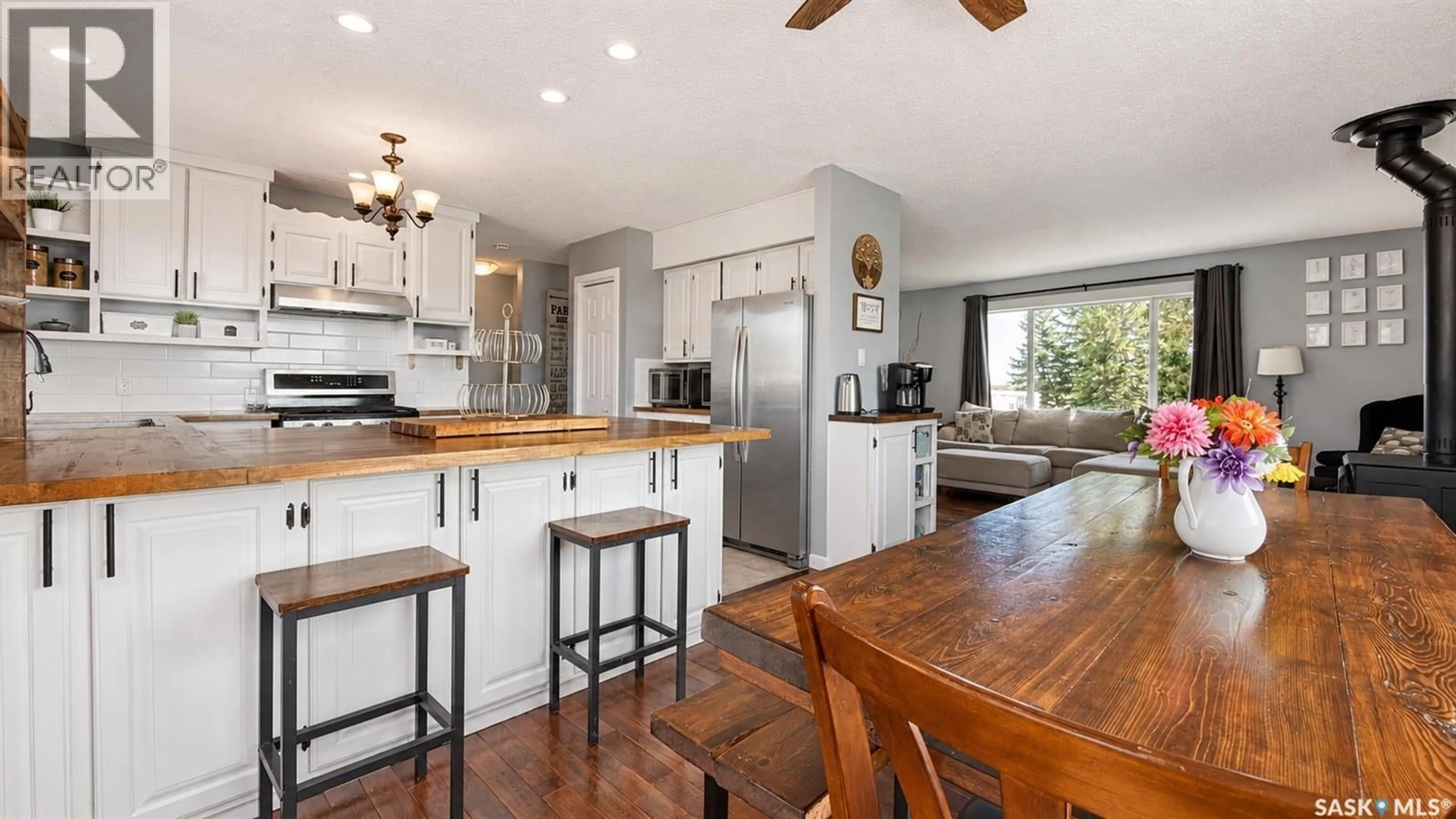 Open concept kitchen, wood/laminate floor for RM OF MCLEOD ACREAGE, Mcleod Rm No. 185 Saskatchewan S0A2B0