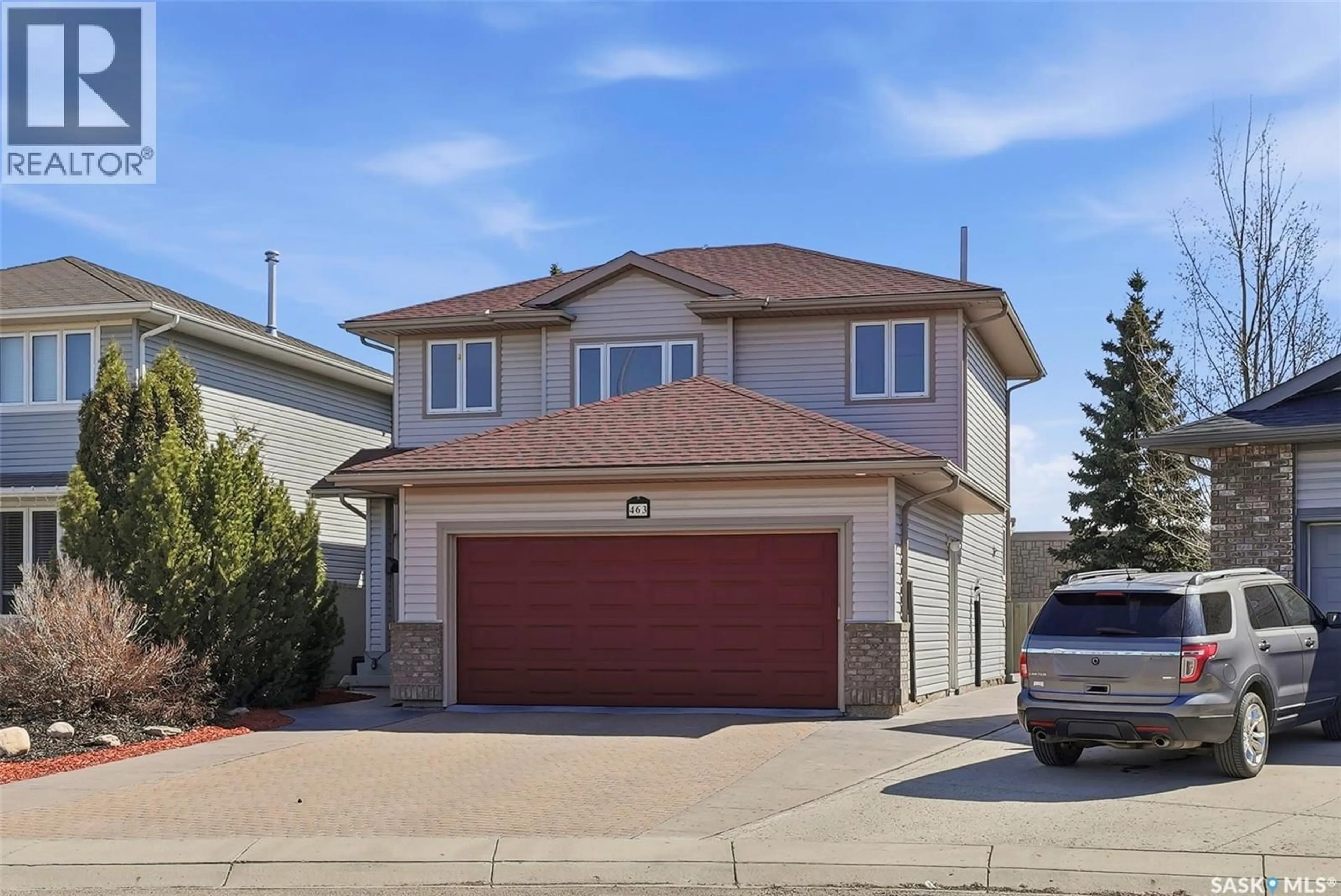 Home with vinyl exterior material, street for 463 BUCKWOLD COVE, Saskatoon Saskatchewan S7N4W1