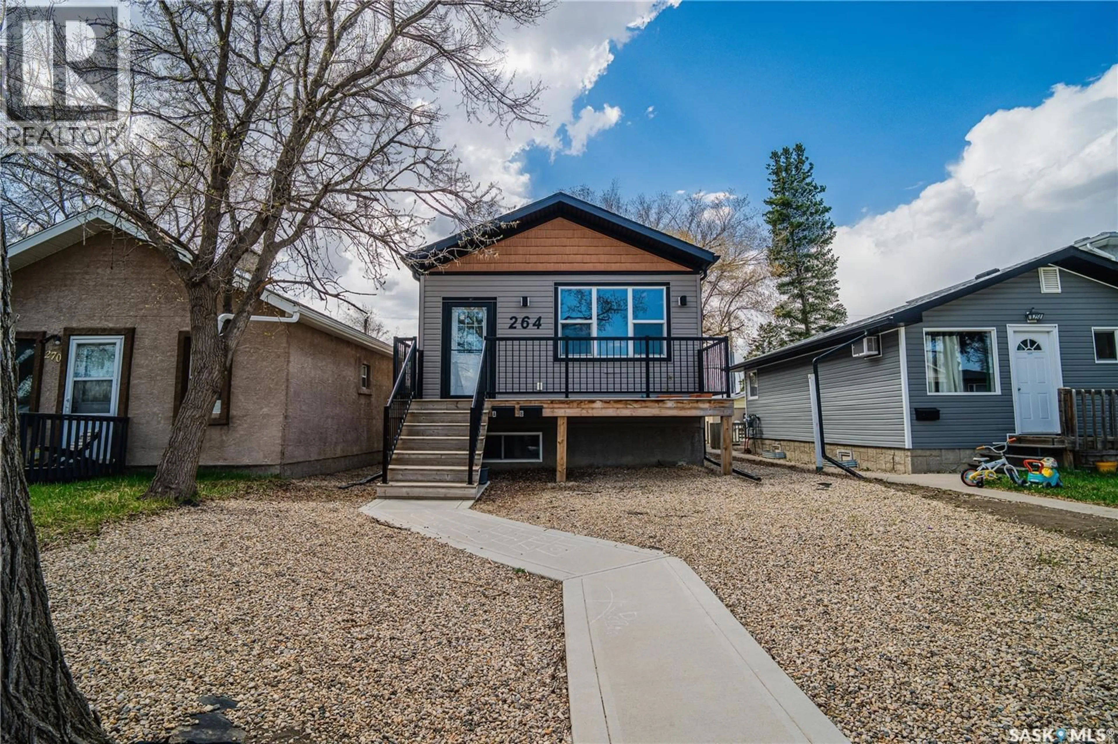 Home with vinyl exterior material, street for 264 OSLER STREET, Regina Saskatchewan S4R1V4