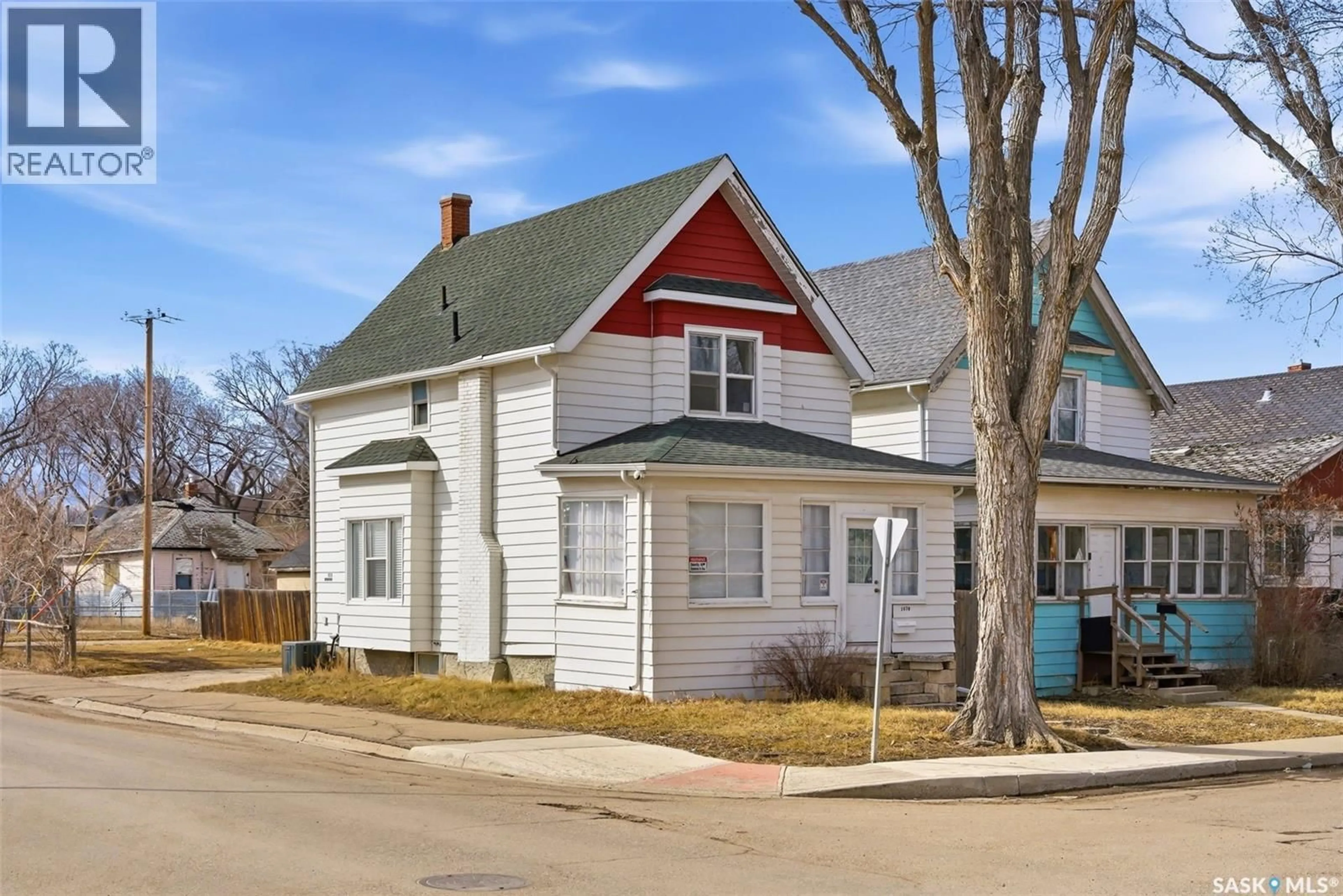 Home with vinyl exterior material, street for 1578 RETALLACK STREET, Regina Saskatchewan S4T2J4