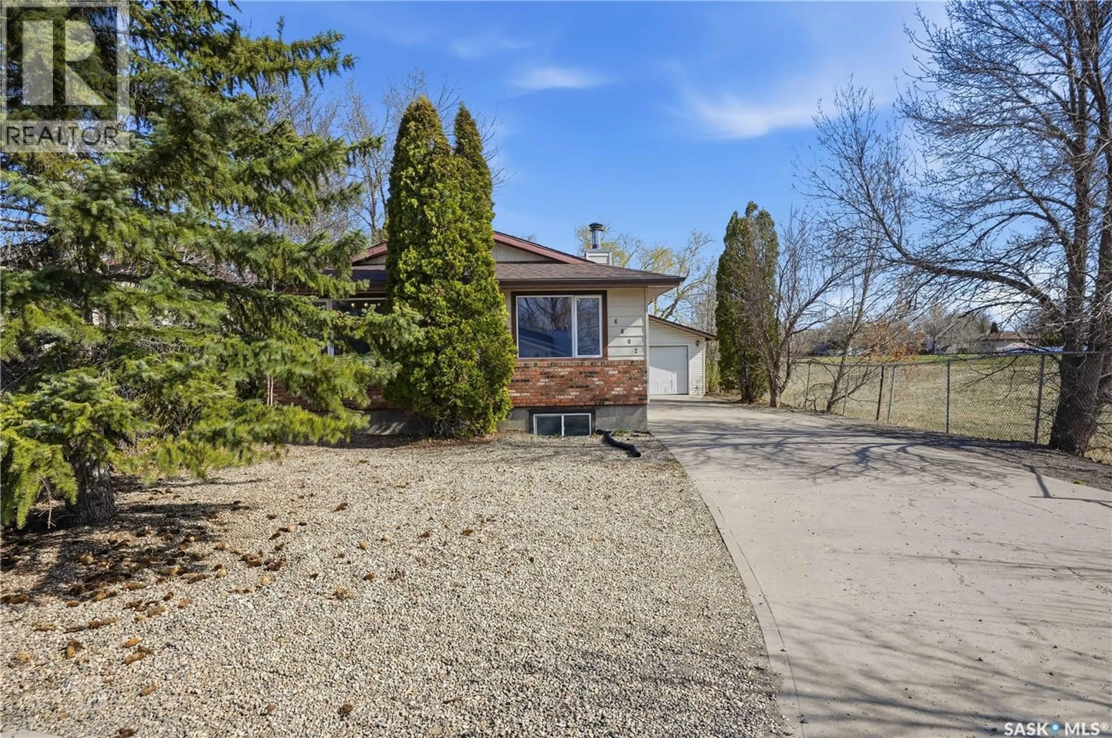 A pic from outside/outdoor area/front of a property/back of a property/a pic from drone, street for 6602 COLLINS BAY, Regina Saskatchewan S4X1T2