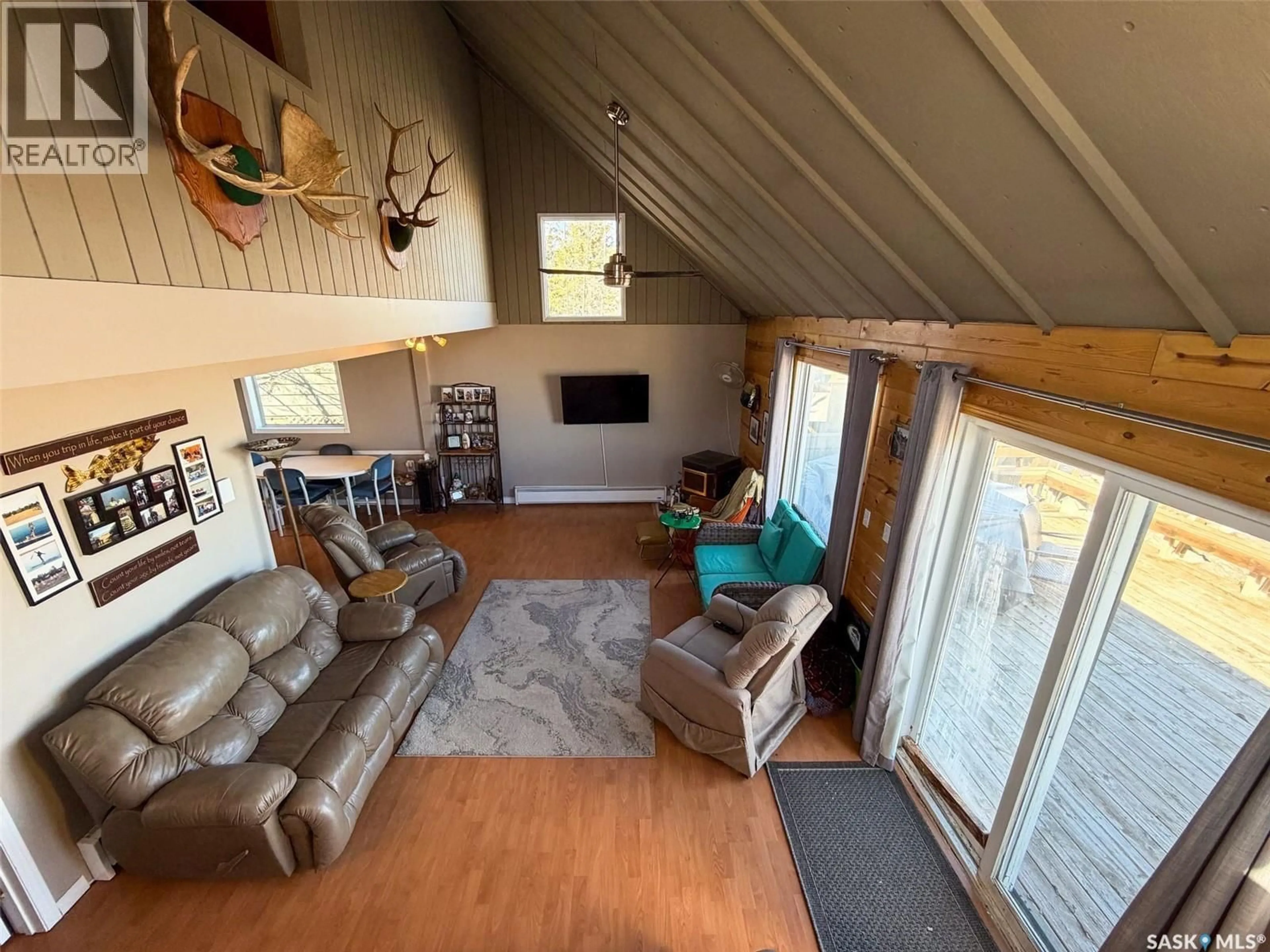 Living room with furniture, unknown for MEETING LAKE CABIN, Meeting Lake Saskatchewan S0M2L0