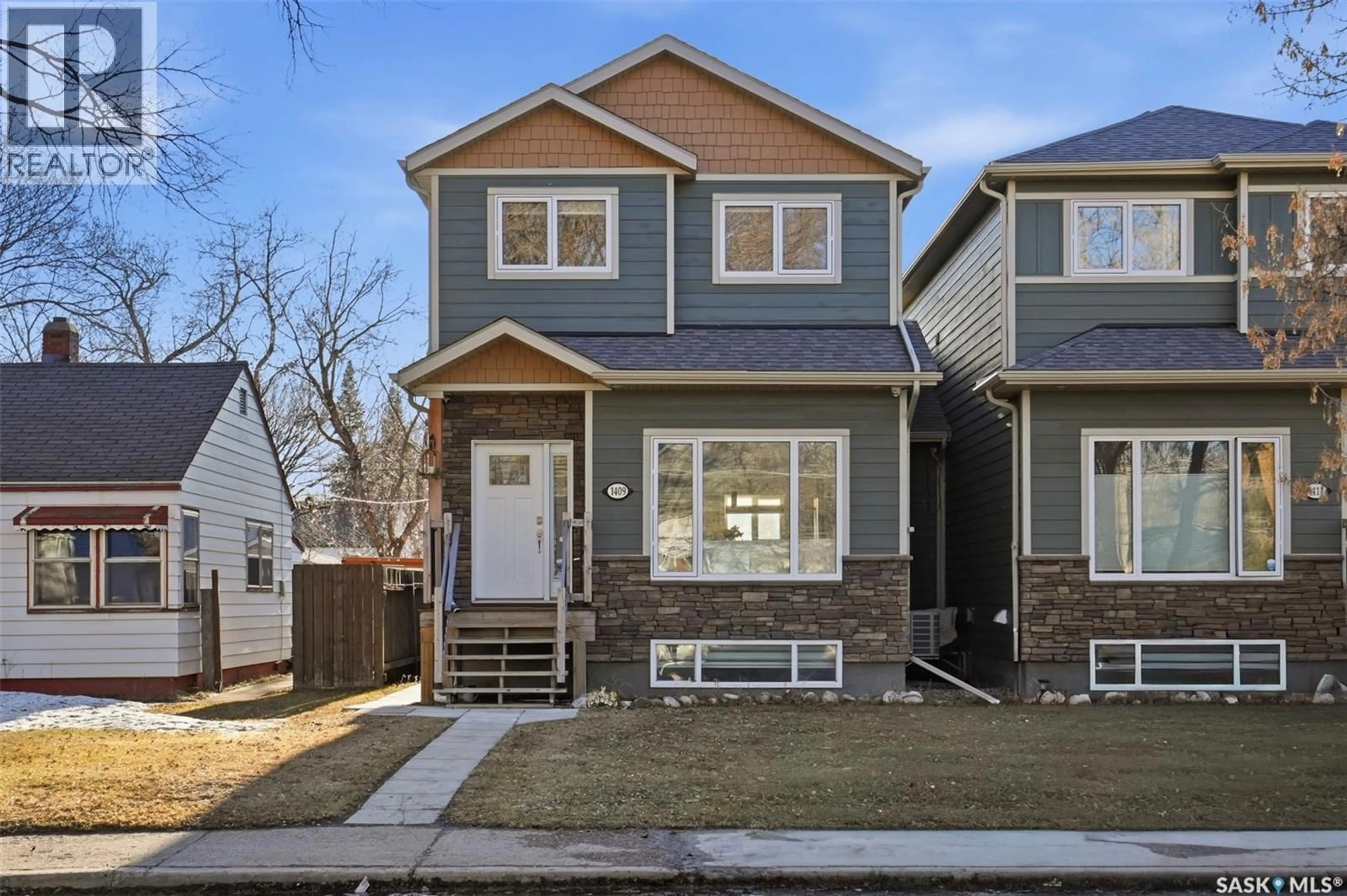 Home with brick exterior material, street for 1409 2ND AVENUE, Saskatoon Saskatchewan S7K2E7