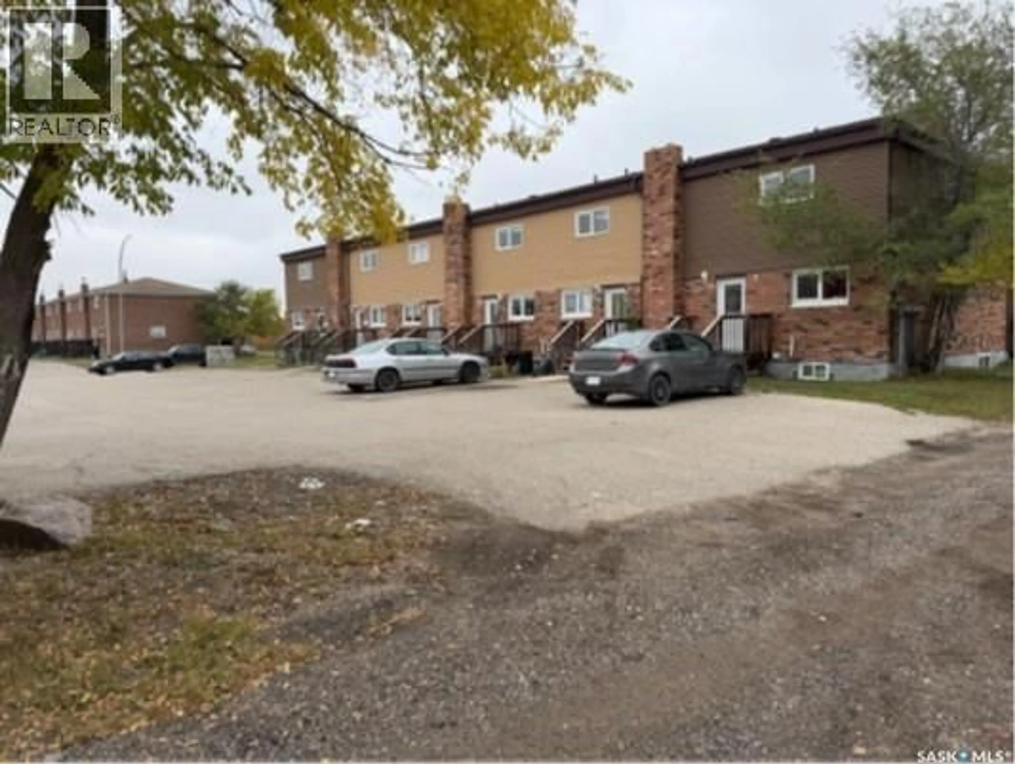 A pic from outside/outdoor area/front of a property/back of a property/a pic from drone, street for 7-8-14-15 ALLAN BAY, Yorkton Saskatchewan S3N3H1