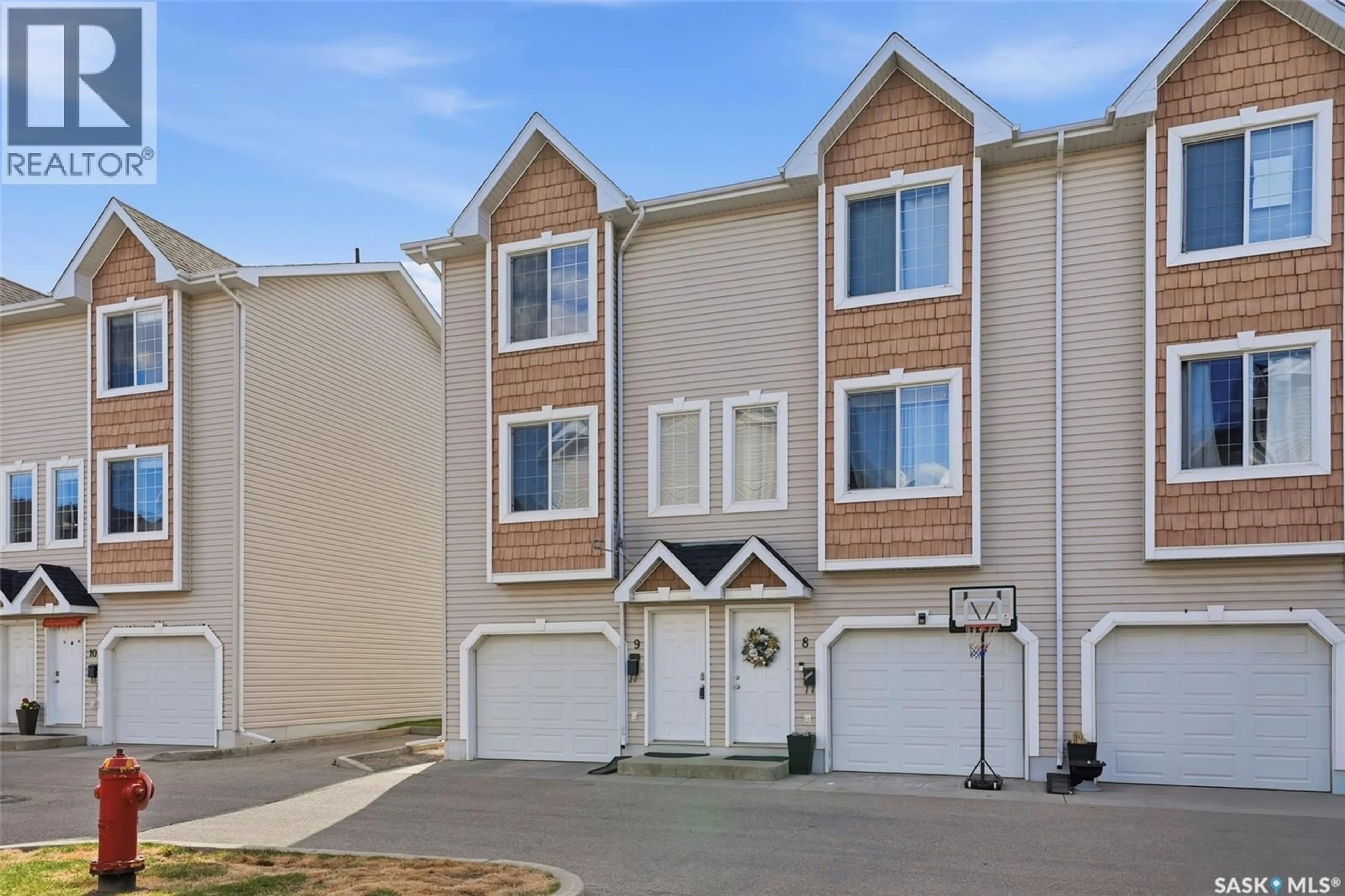 Home with vinyl exterior material, street for 9 243 HEROLD TERRACE, Saskatoon Saskatchewan S7V1J5