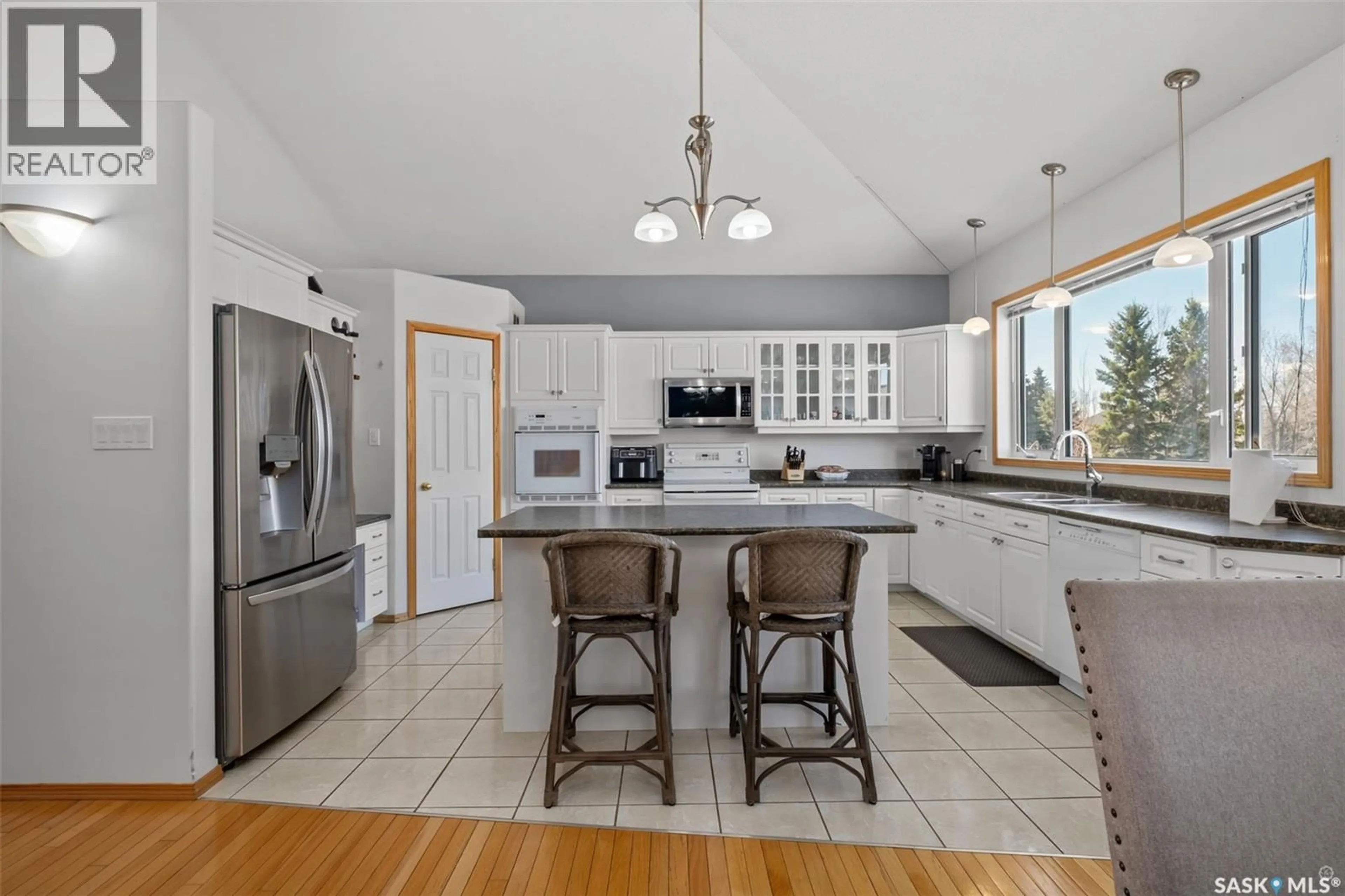 Open concept kitchen, ceramic/tile floor for 35 FESCHUK PLACE, Prince Albert Saskatchewan S6X1C6