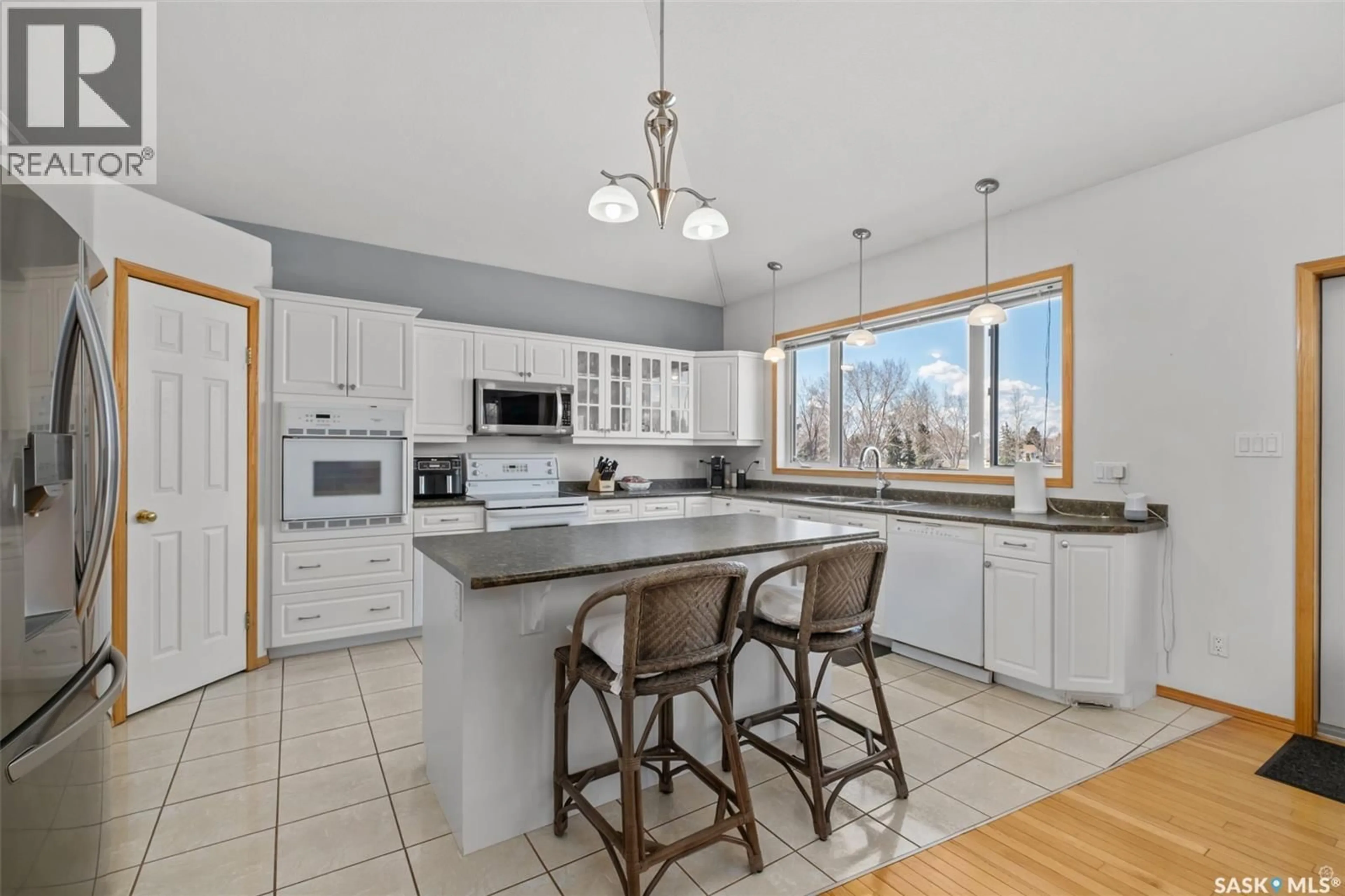 Open concept kitchen, ceramic/tile floor for 35 FESCHUK PLACE, Prince Albert Saskatchewan S6X1C6
