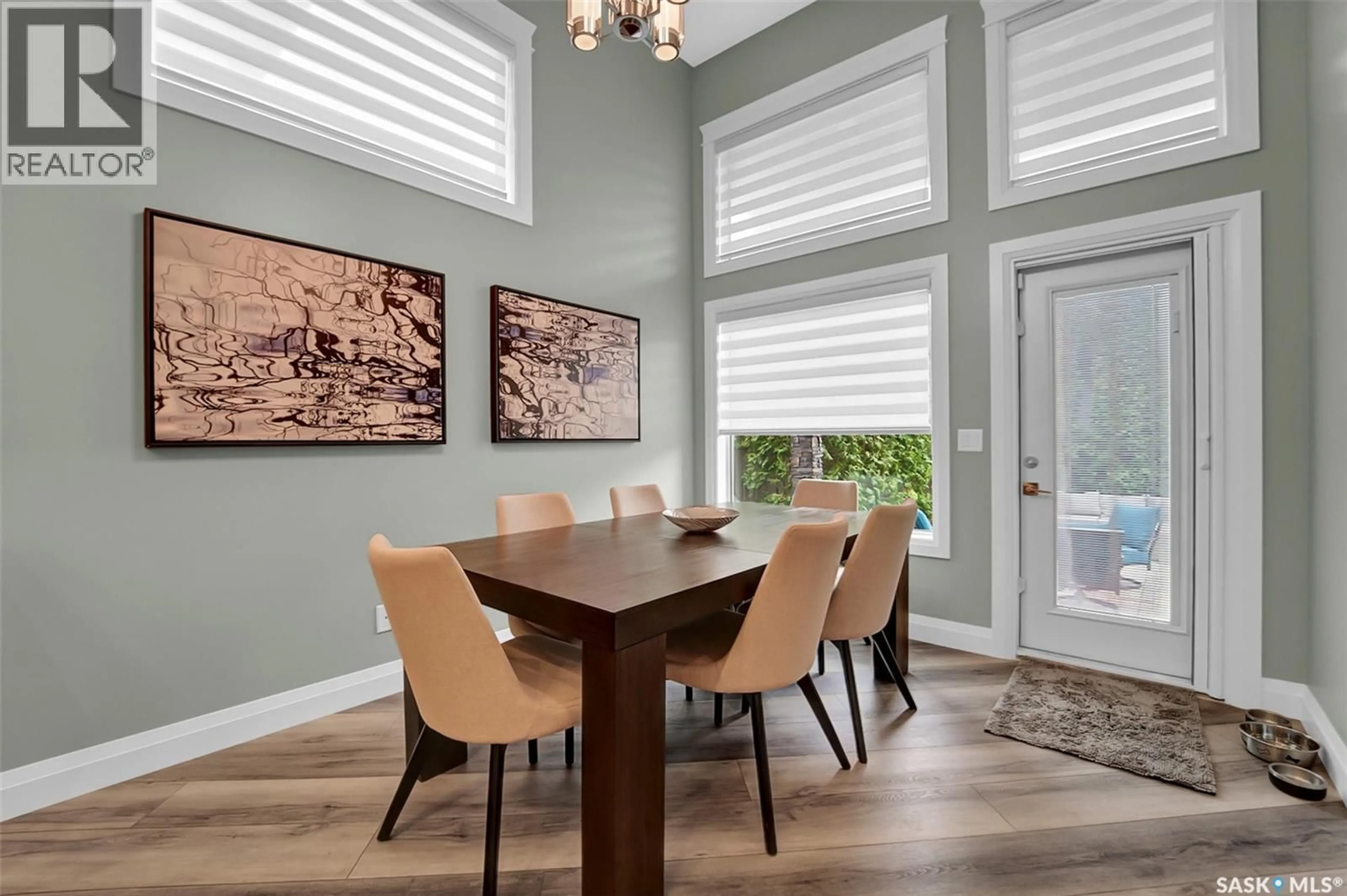 Dining room, wood/laminate floor for 303 BROOKMORE CRESCENT, Saskatoon Saskatchewan S7V0B1