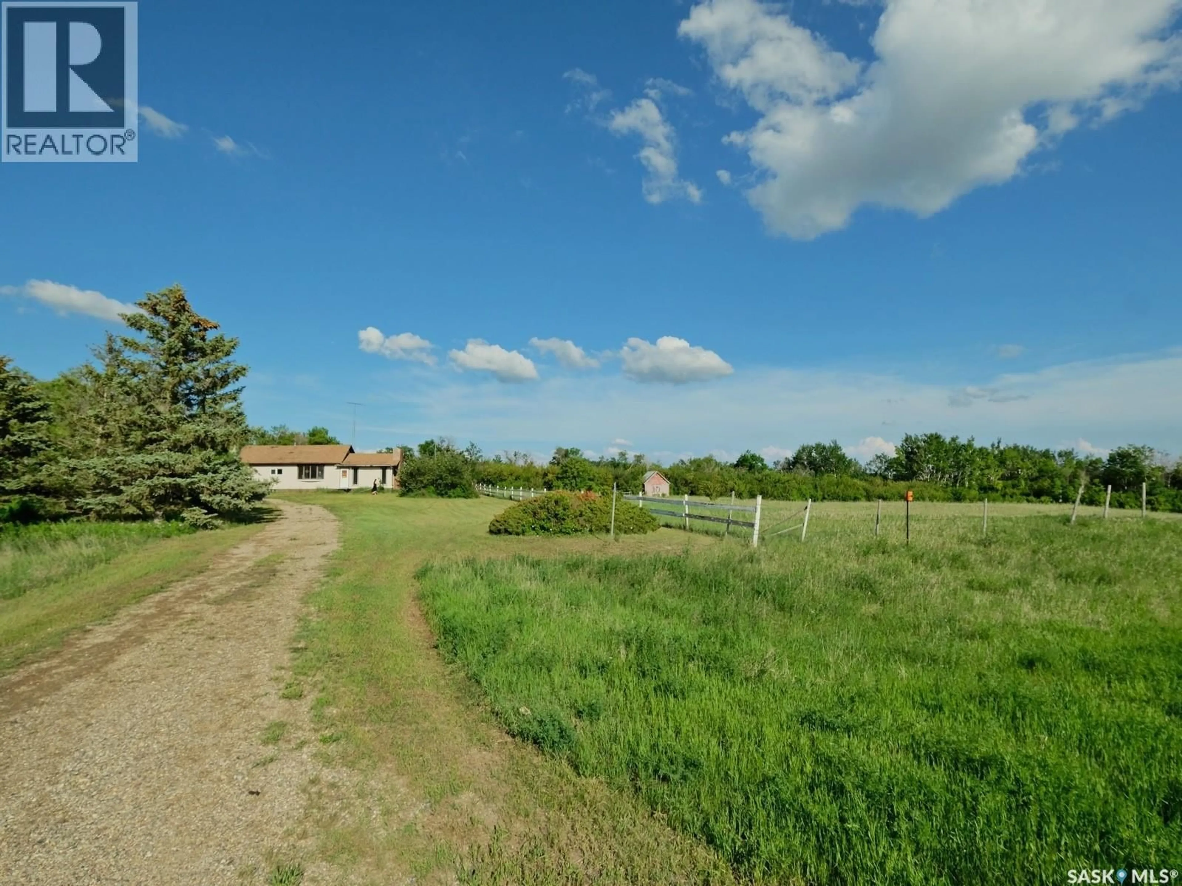 A pic from outside/outdoor area/front of a property/back of a property/a pic from drone, street for North - BIGGAR ACREAGE, Biggar Rm No. 347 Saskatchewan S0K0M0