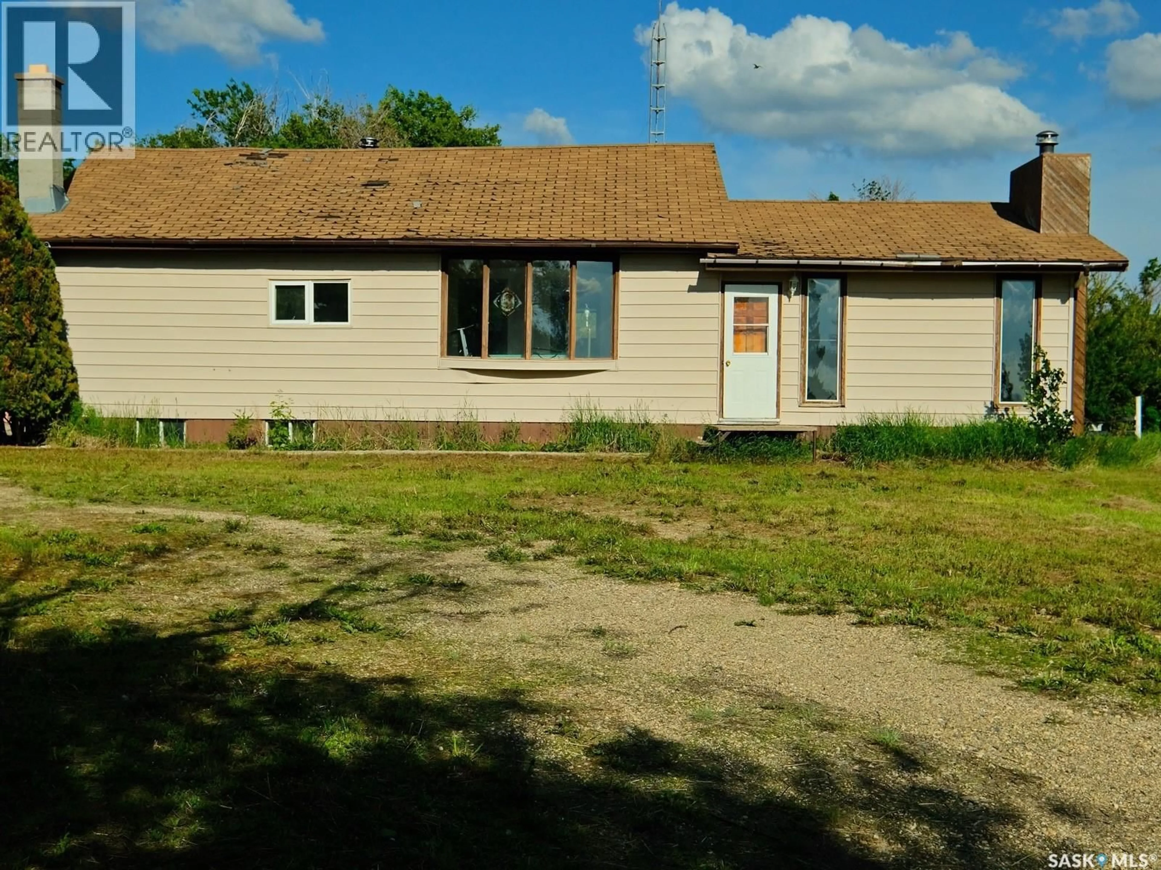 A pic from outside/outdoor area/front of a property/back of a property/a pic from drone, building for North - BIGGAR ACREAGE, Biggar Rm No. 347 Saskatchewan S0K0M0