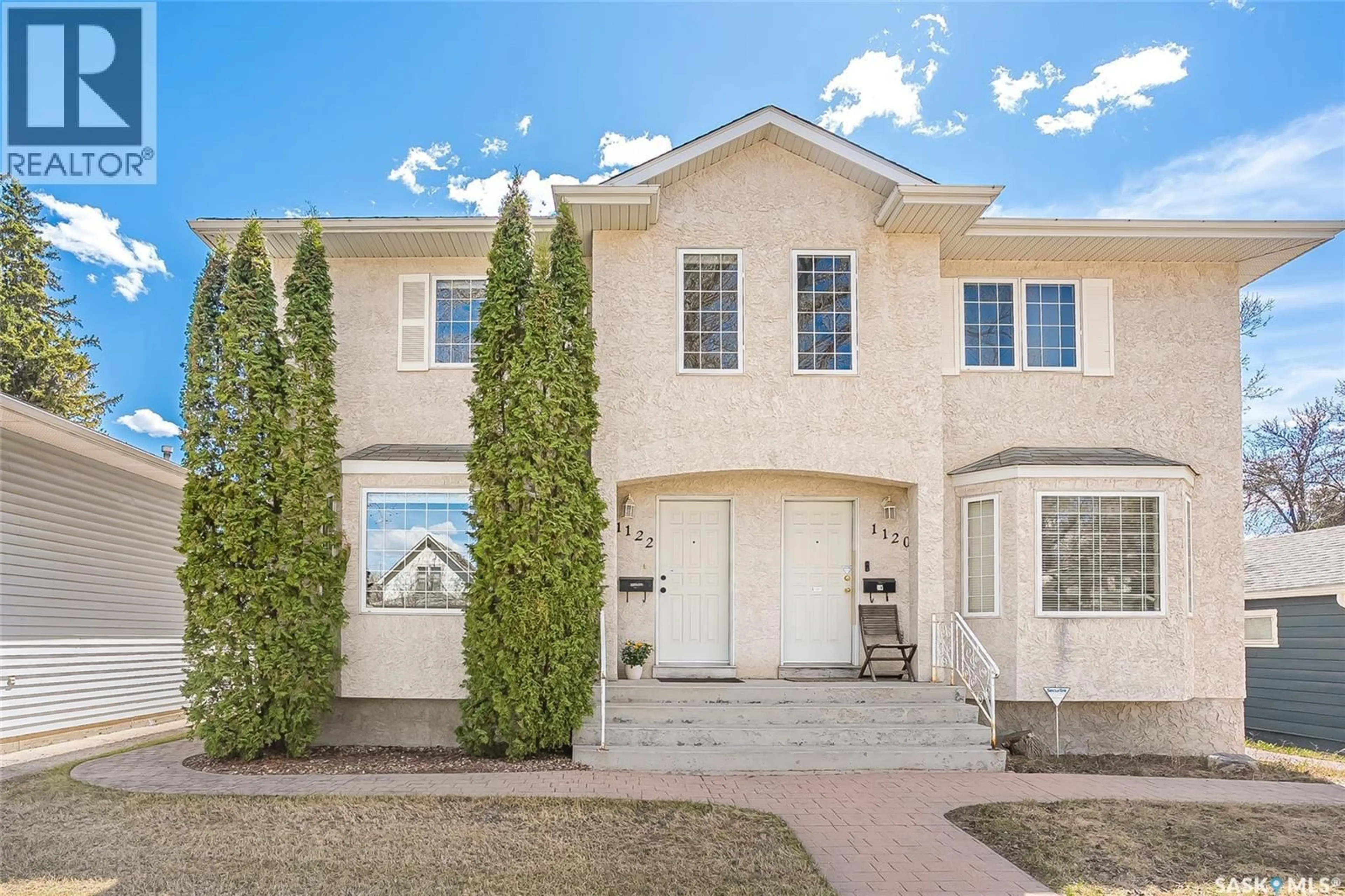 Home with brick exterior material, street for 1122 12TH STREET, Saskatoon Saskatchewan S7H0E2