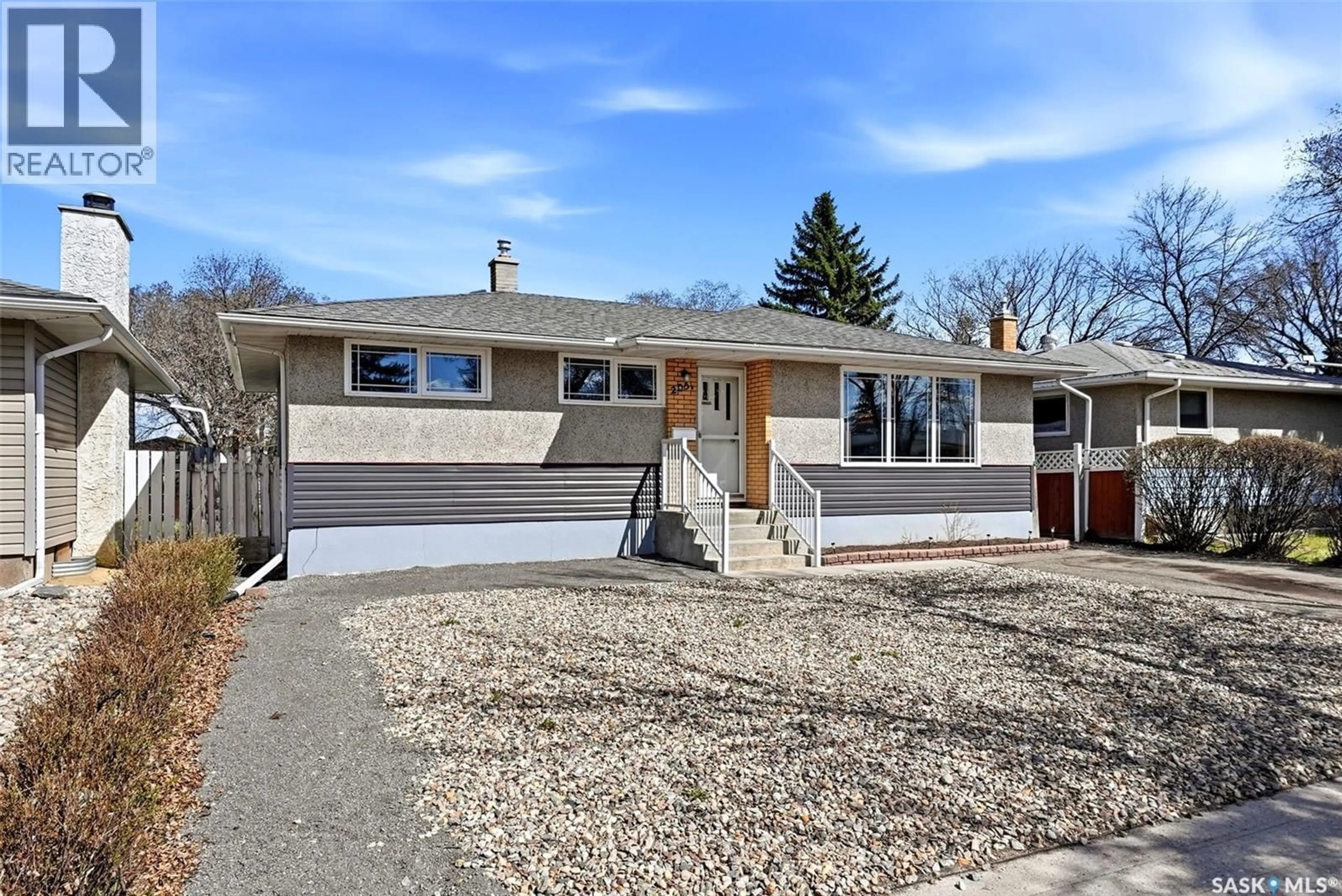 Home with vinyl exterior material, street for 205 ARGYLE STREET, Regina Saskatchewan S4R4C7