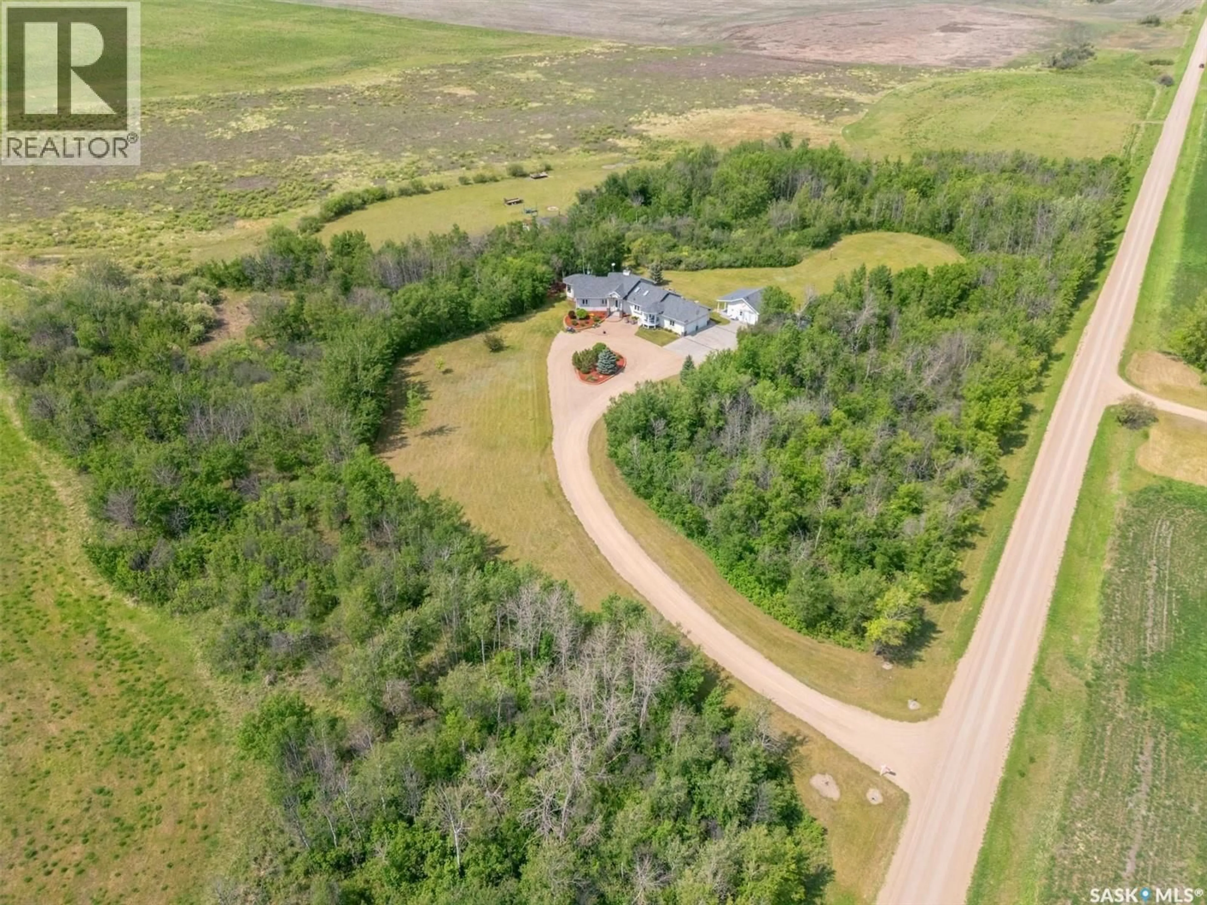 A pic from outside/outdoor area/front of a property/back of a property/a pic from drone, unknown for MEADOW ACREAGE, Corman Park Rm No. 344 Saskatchewan S7V0A9