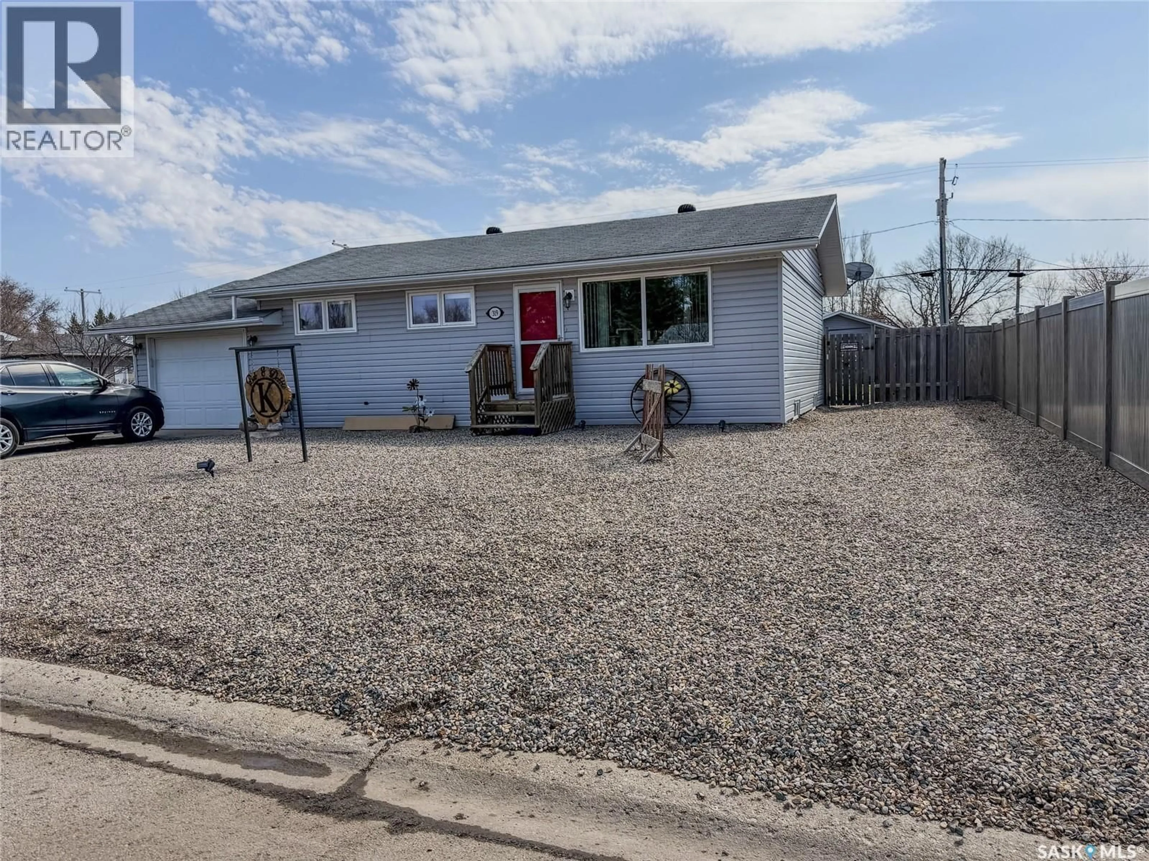 A pic from outside/outdoor area/front of a property/back of a property/a pic from drone, street for E - 319 MARCH AVENUE, Langenburg Saskatchewan S0A2A0
