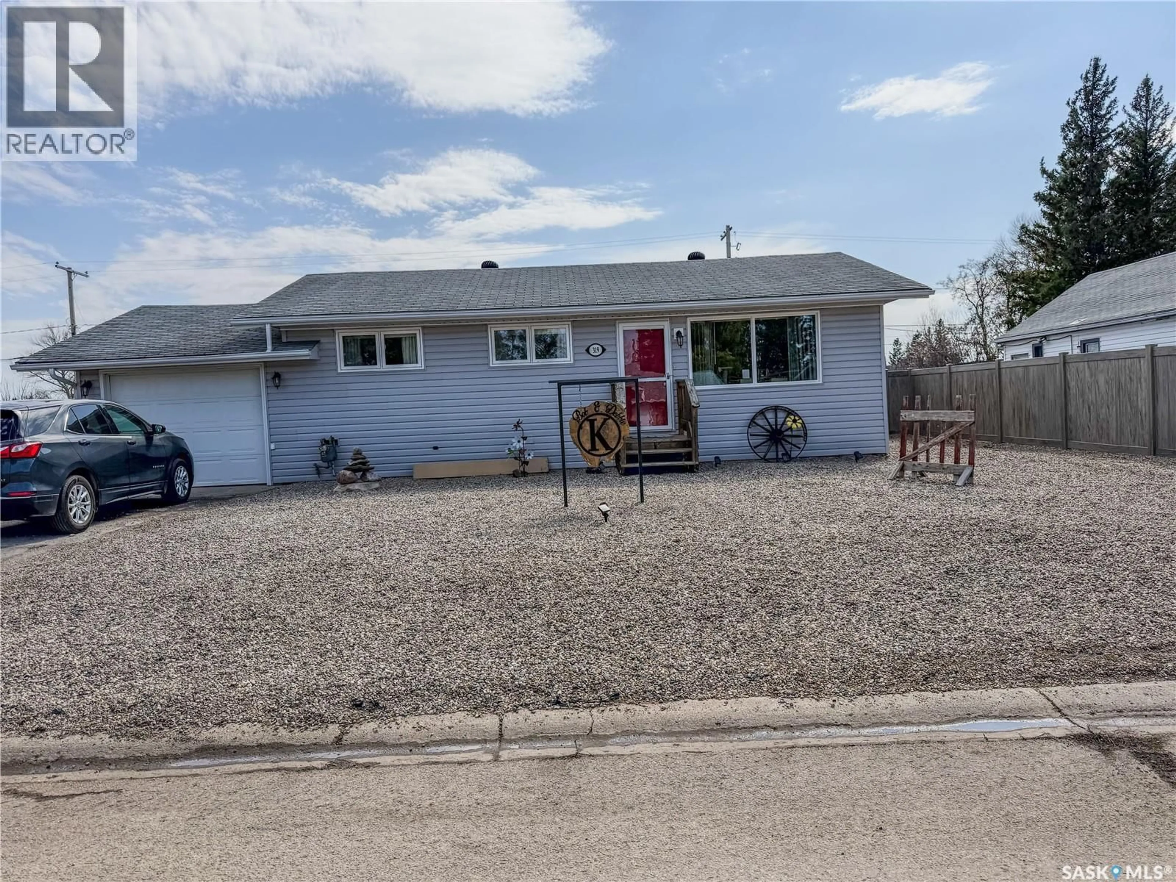 Home with vinyl exterior material, street for E - 319 MARCH AVENUE, Langenburg Saskatchewan S0A2A0