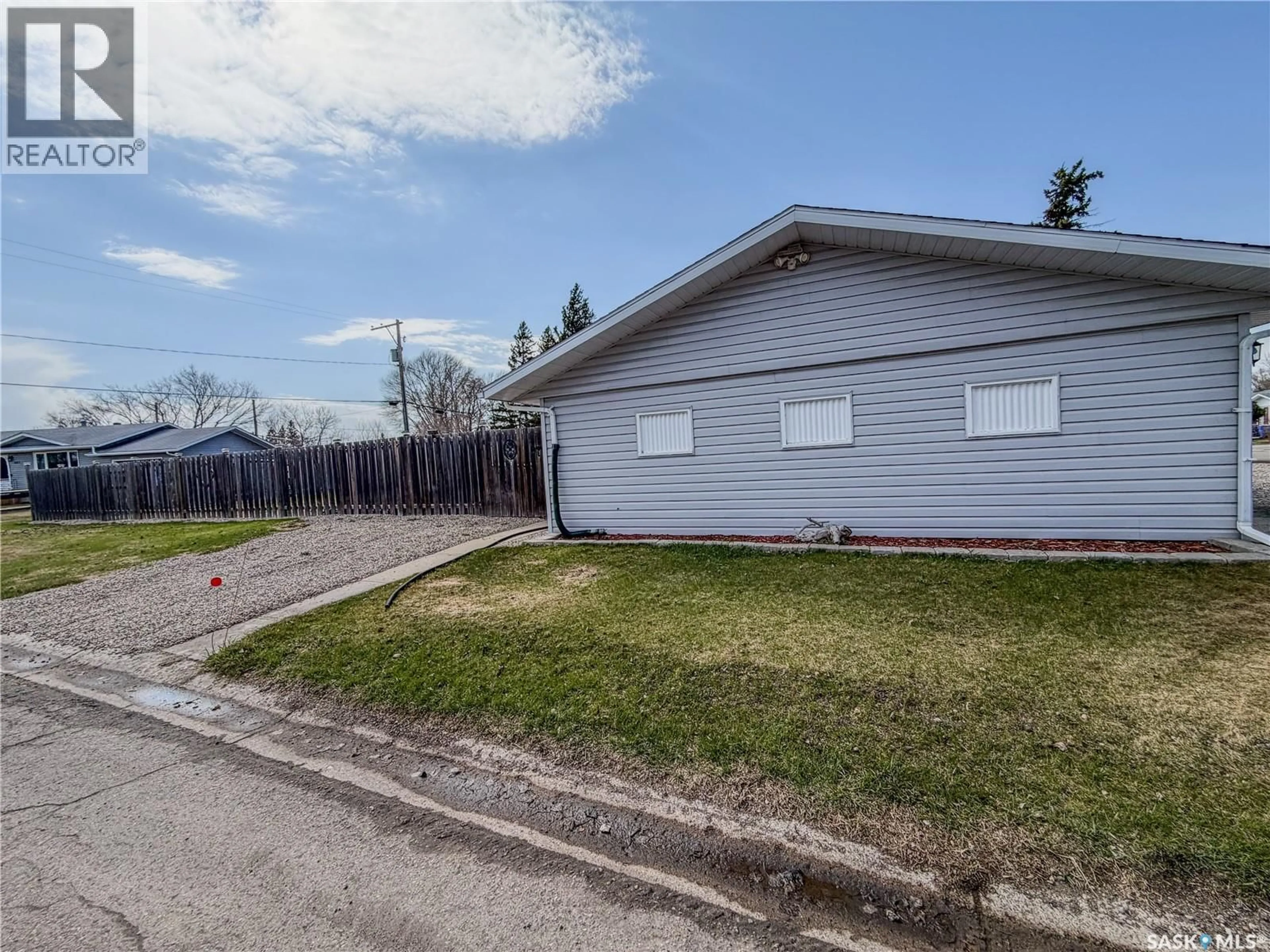 A pic from outside/outdoor area/front of a property/back of a property/a pic from drone, street for E - 319 MARCH AVENUE, Langenburg Saskatchewan S0A2A0