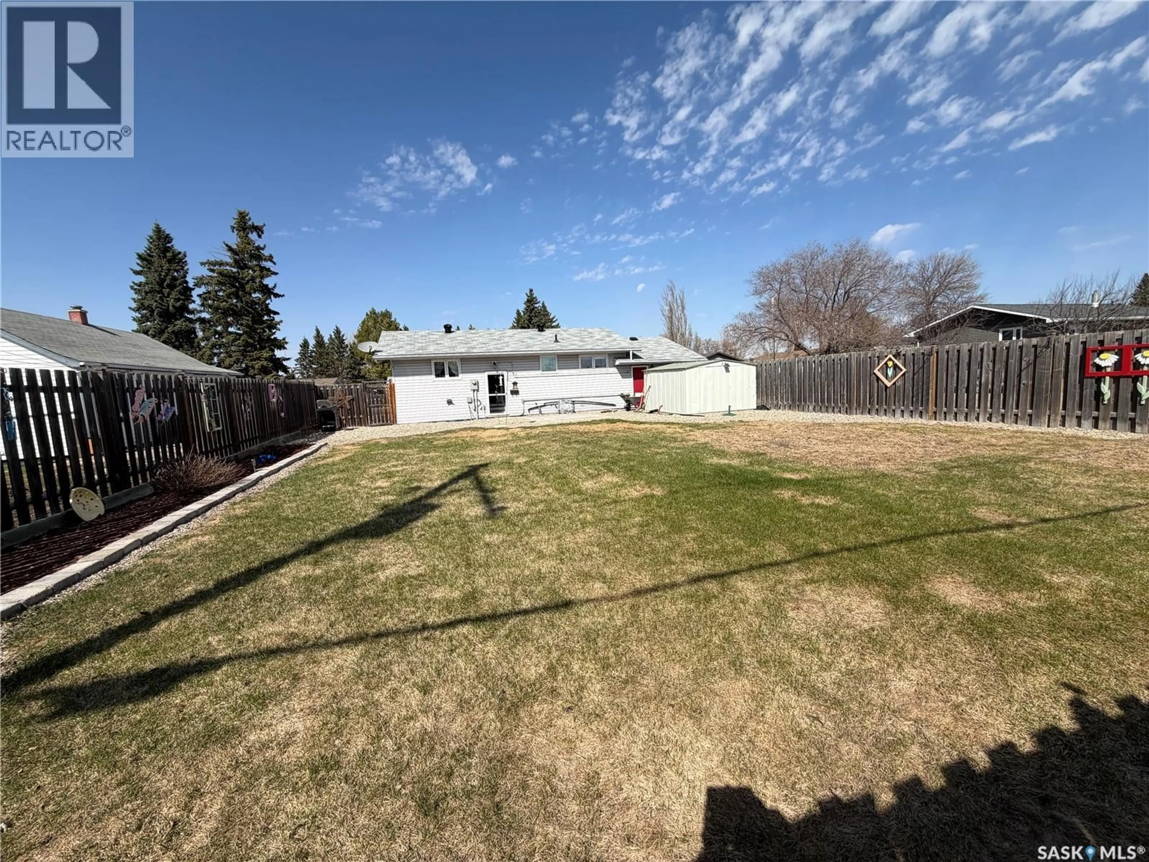 A pic from outside/outdoor area/front of a property/back of a property/a pic from drone, street for E - 319 MARCH AVENUE, Langenburg Saskatchewan S0A2A0