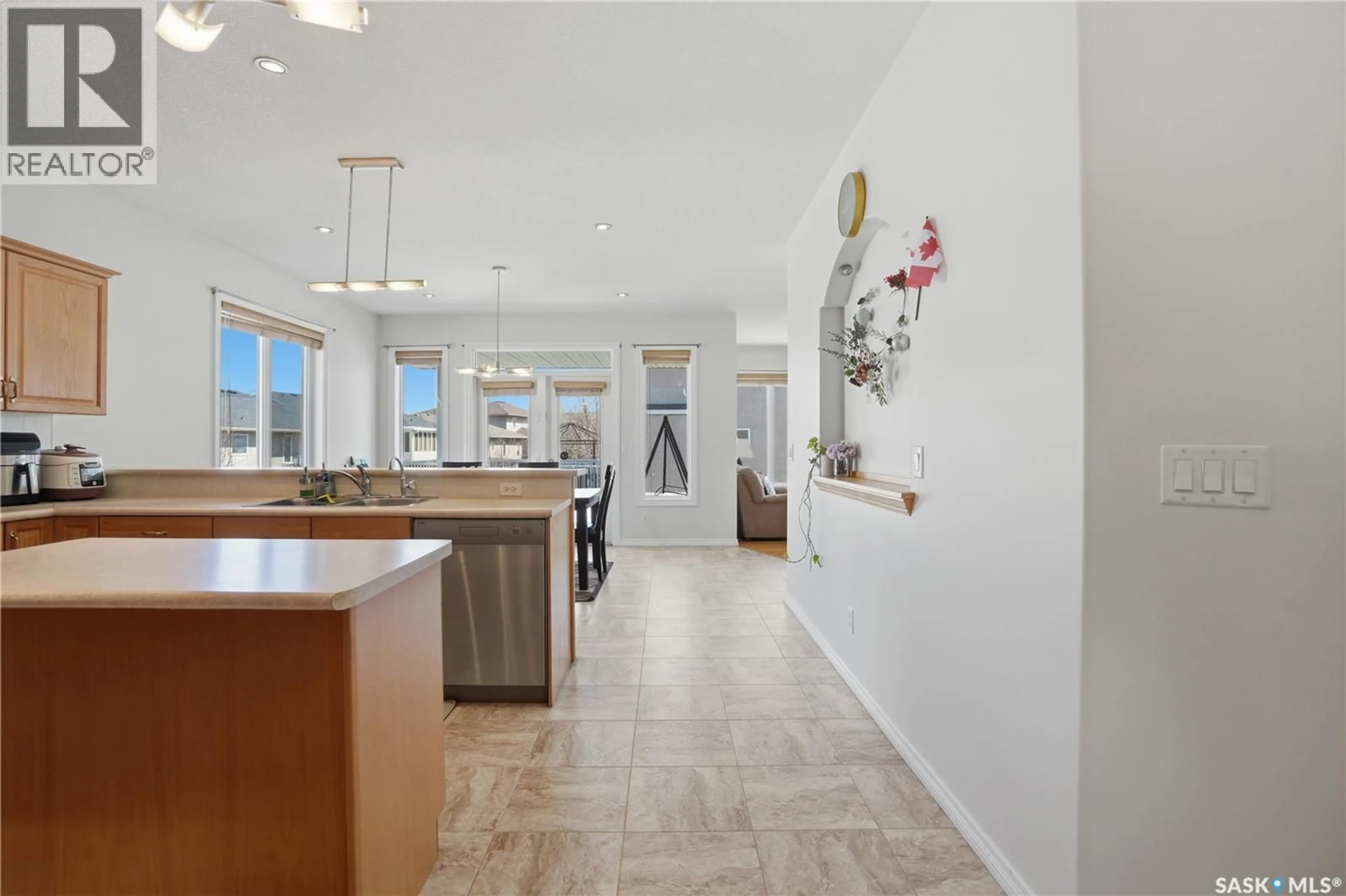 Open concept kitchen, ceramic/tile floor for E - 3714 SANDRINGHAM ROAD, Regina Saskatchewan S4V0N5