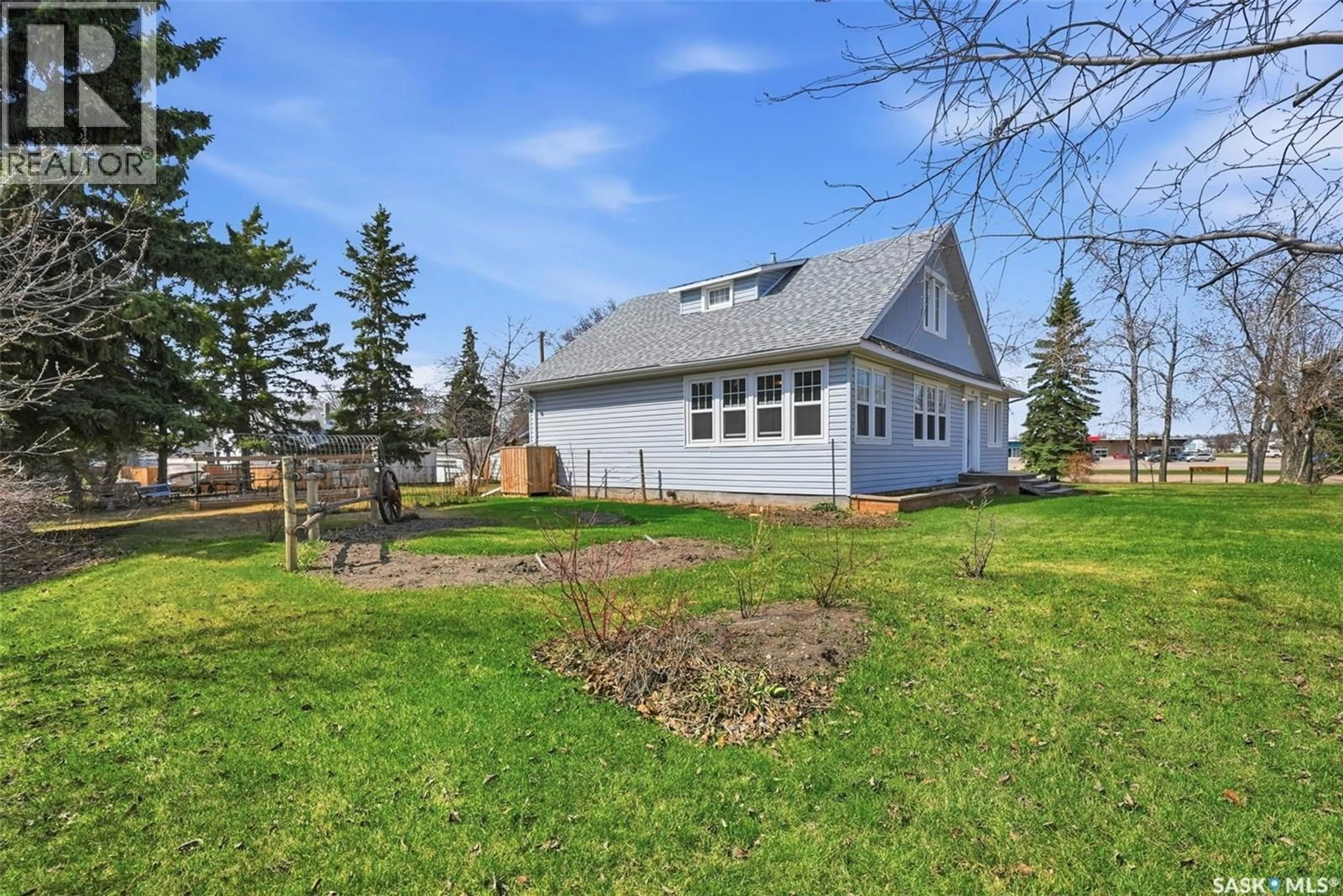 A pic from outside/outdoor area/front of a property/back of a property/a pic from drone, unknown for 62 ANTRIM STREET, Lanigan Saskatchewan S0K2M0