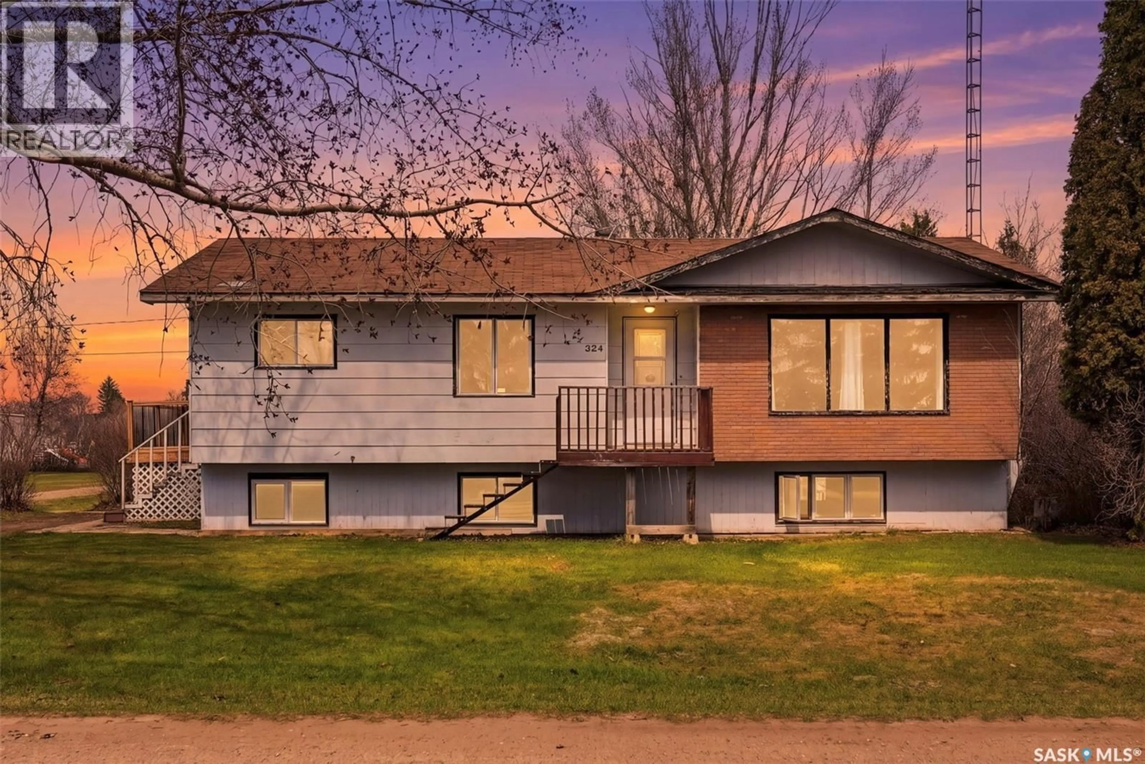 Home with vinyl exterior material, street for 324 NORREYS STREET, Drake Saskatchewan S0K1H0