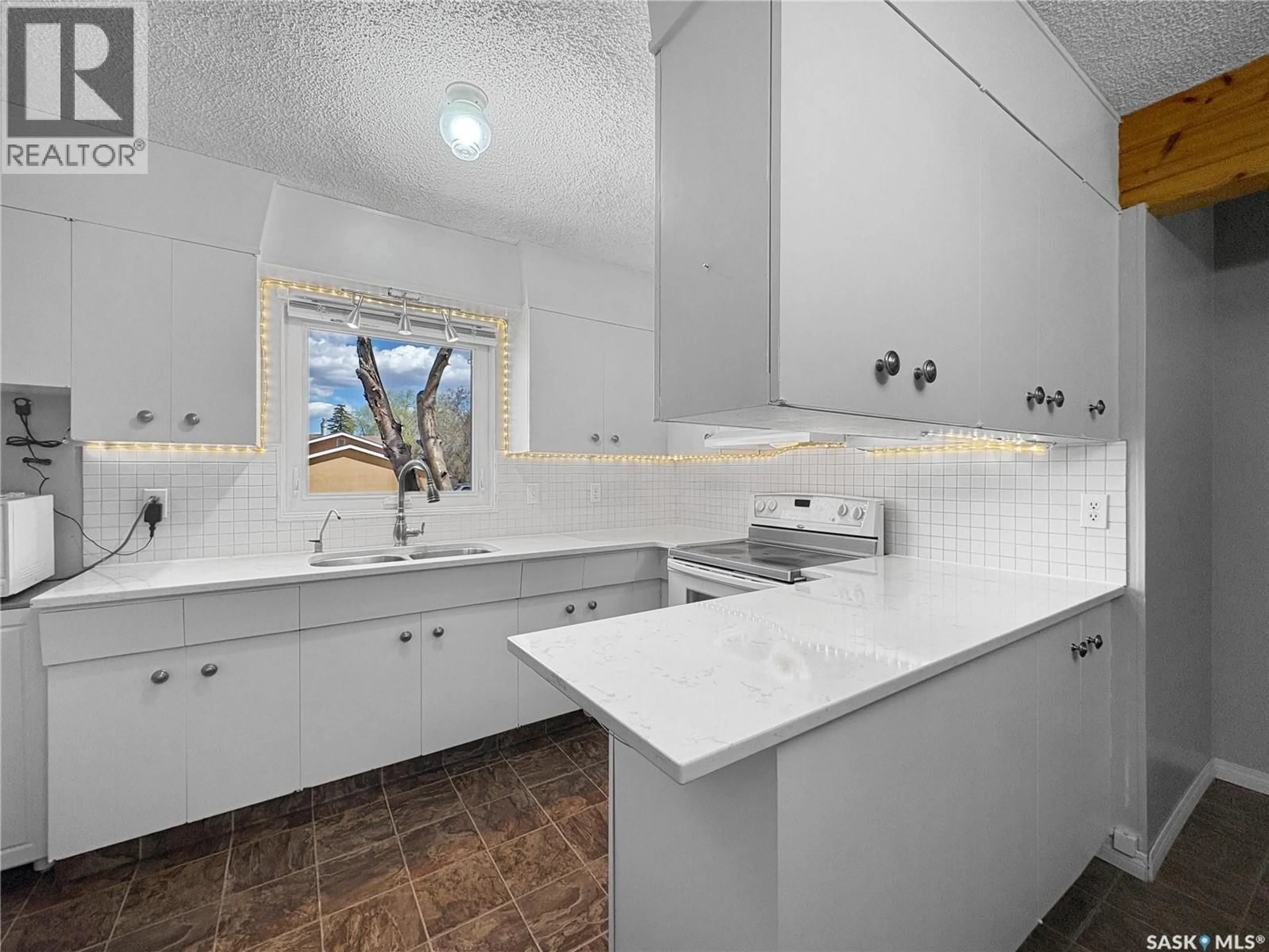 Standard kitchen, ceramic/tile floor for 1762 91ST STREET, North Battleford Saskatchewan S9A0A5