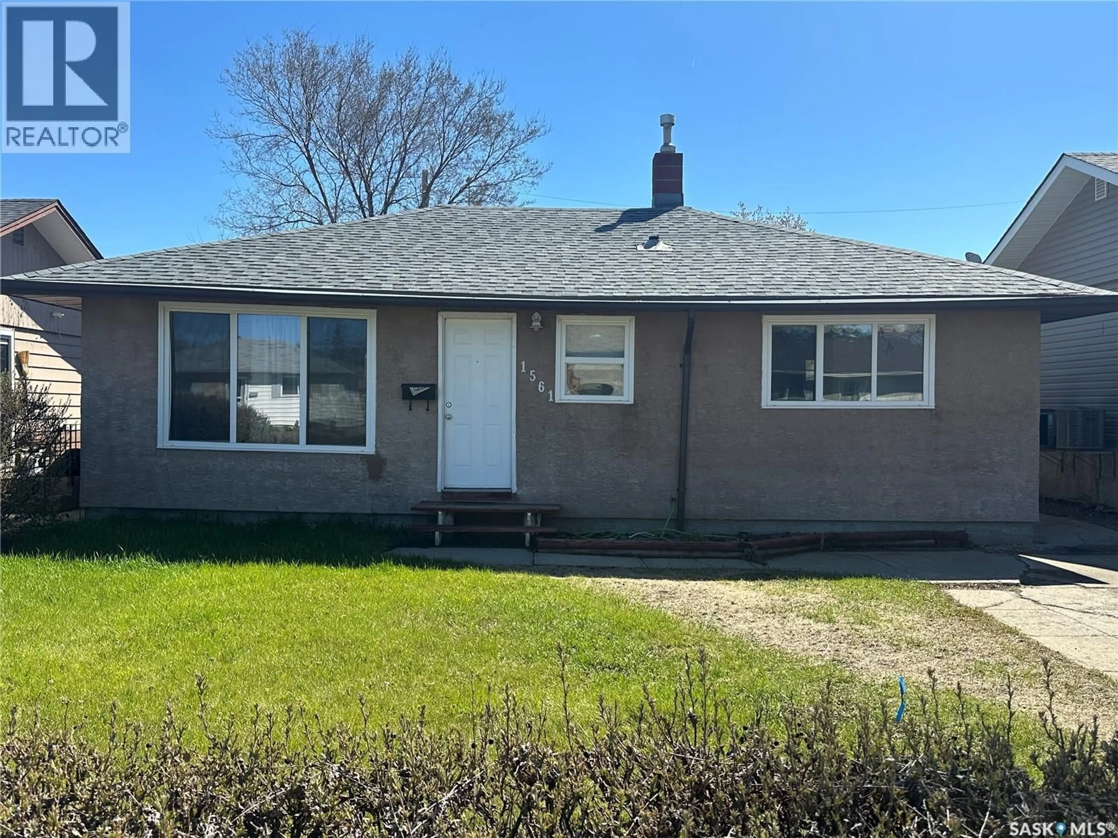 Home with vinyl exterior material, street for 1561 REGENT STREET, Regina Saskatchewan S4N1S1