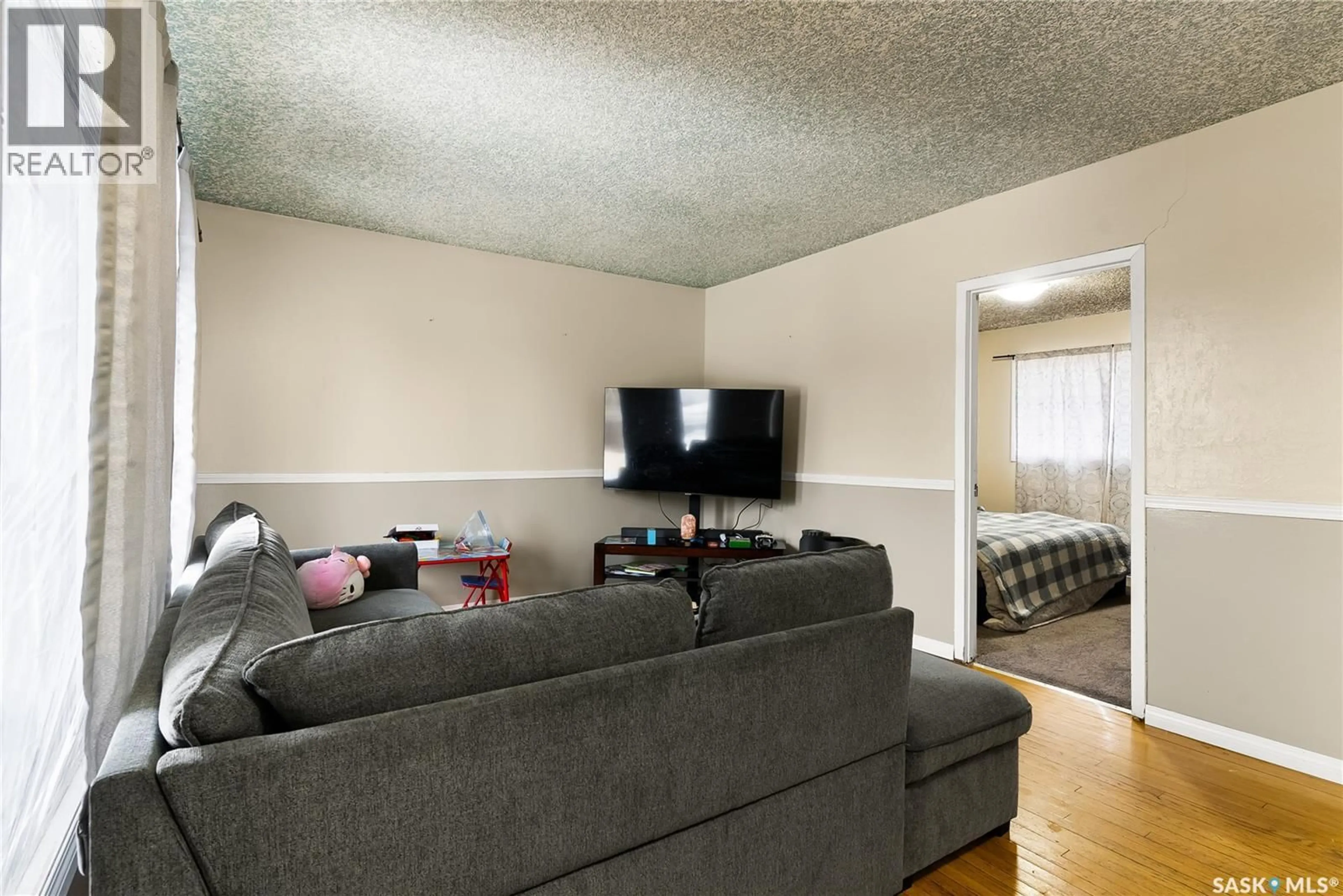 Living room with furniture, unknown for 1561 REGENT STREET, Regina Saskatchewan S4N1S1