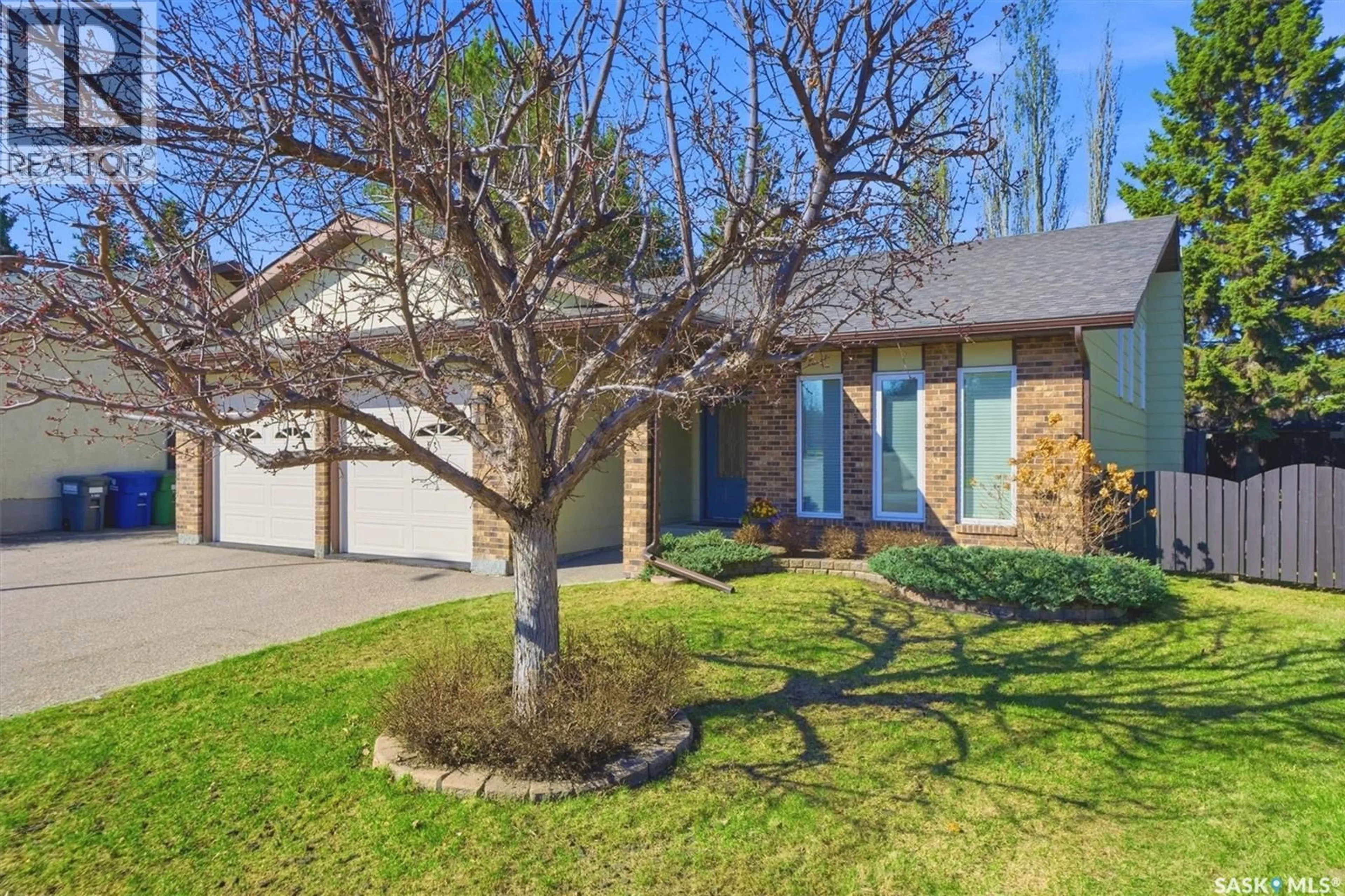 Home with brick exterior material, street for 203 GUSTIN CRESCENT, Saskatoon Saskatchewan S7K6G8
